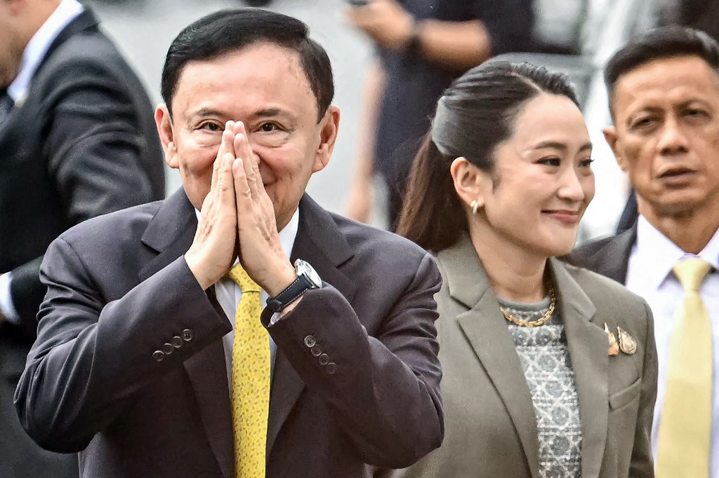 CNA - Thailand's former Prime Minister Thaksin Shinawatra arrives with ...