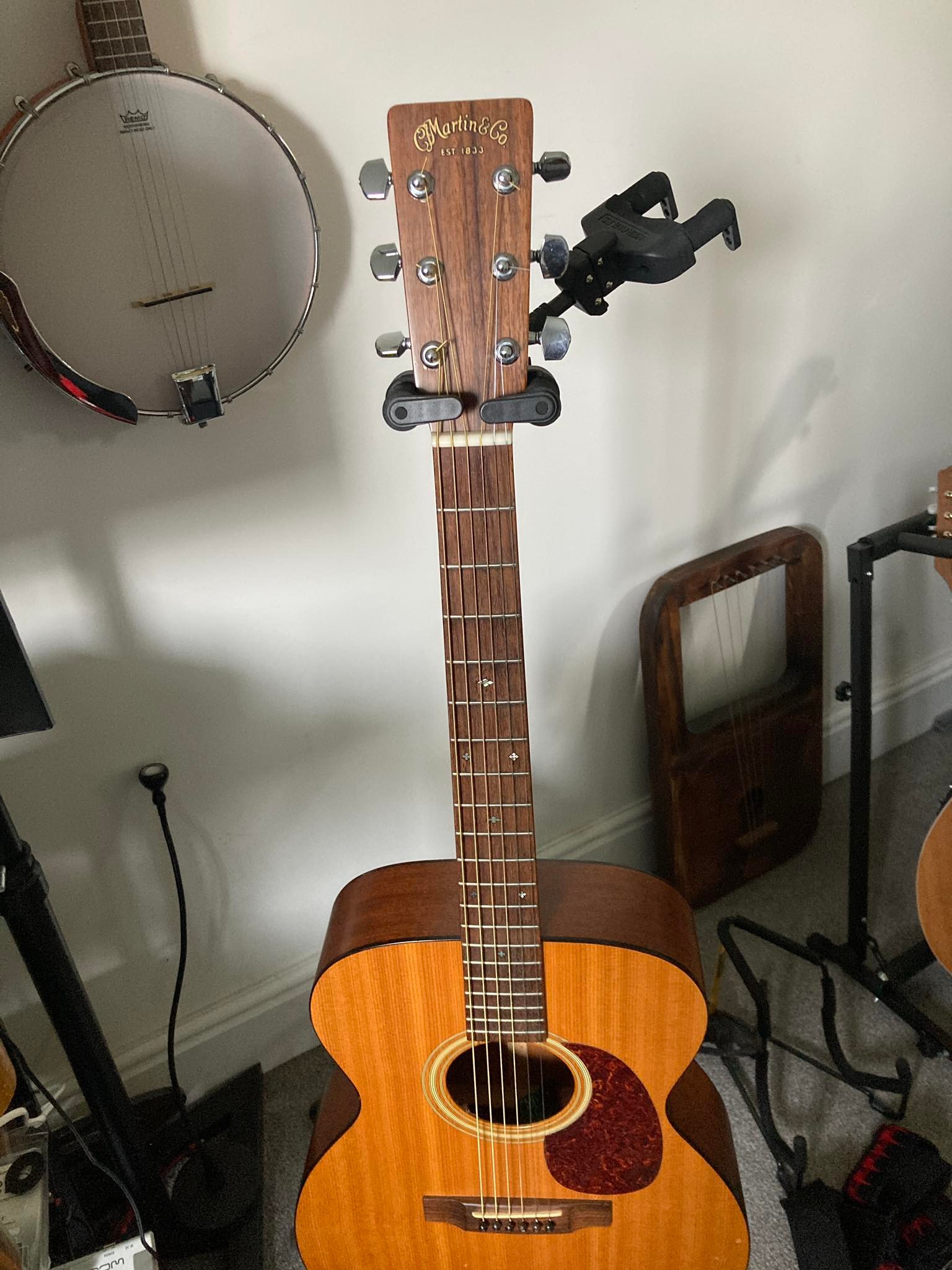 What's the story behind my unique Martin 000-16 guitar?