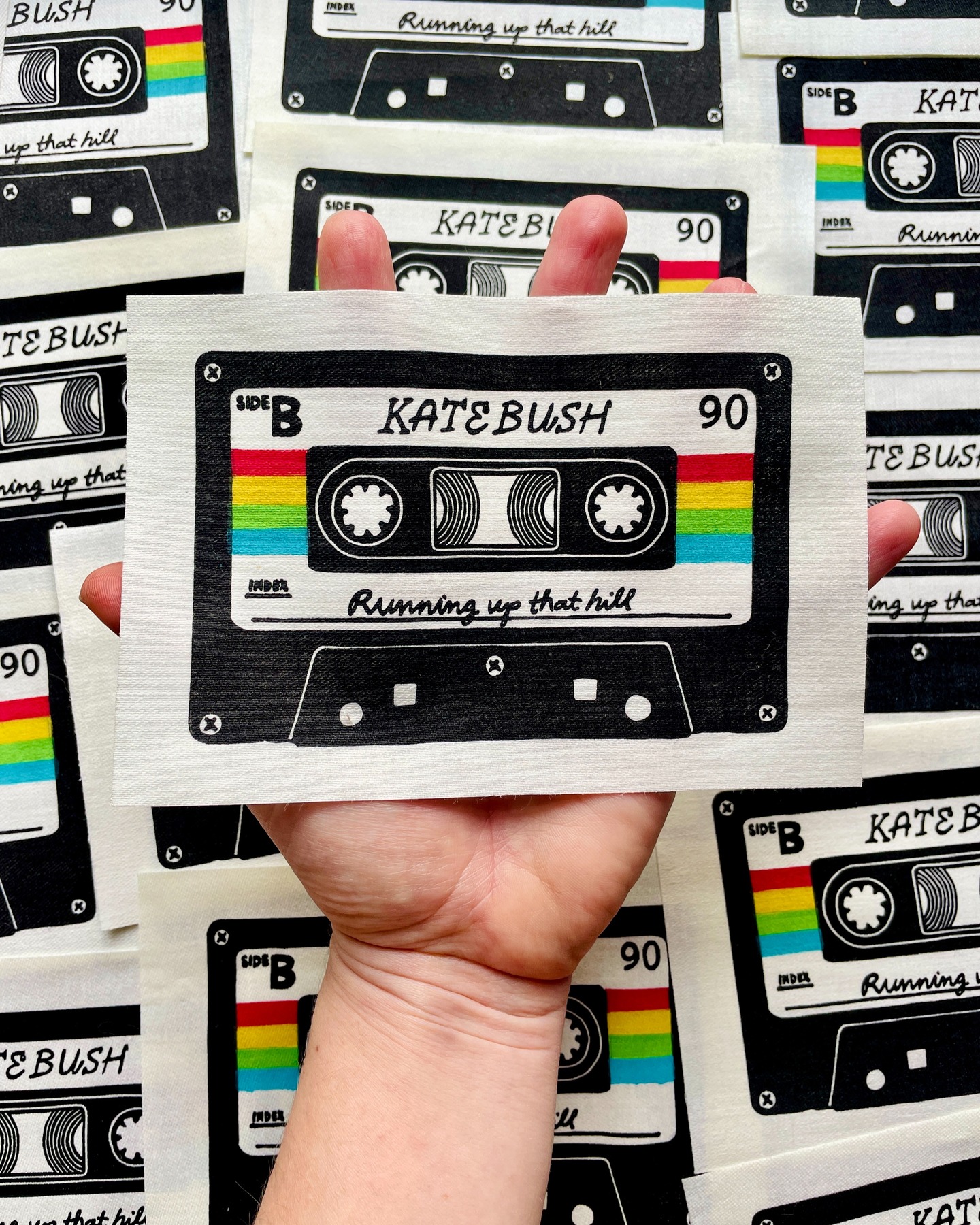 Some still shots of my Kate Bush cassette tape, as prints and as 
