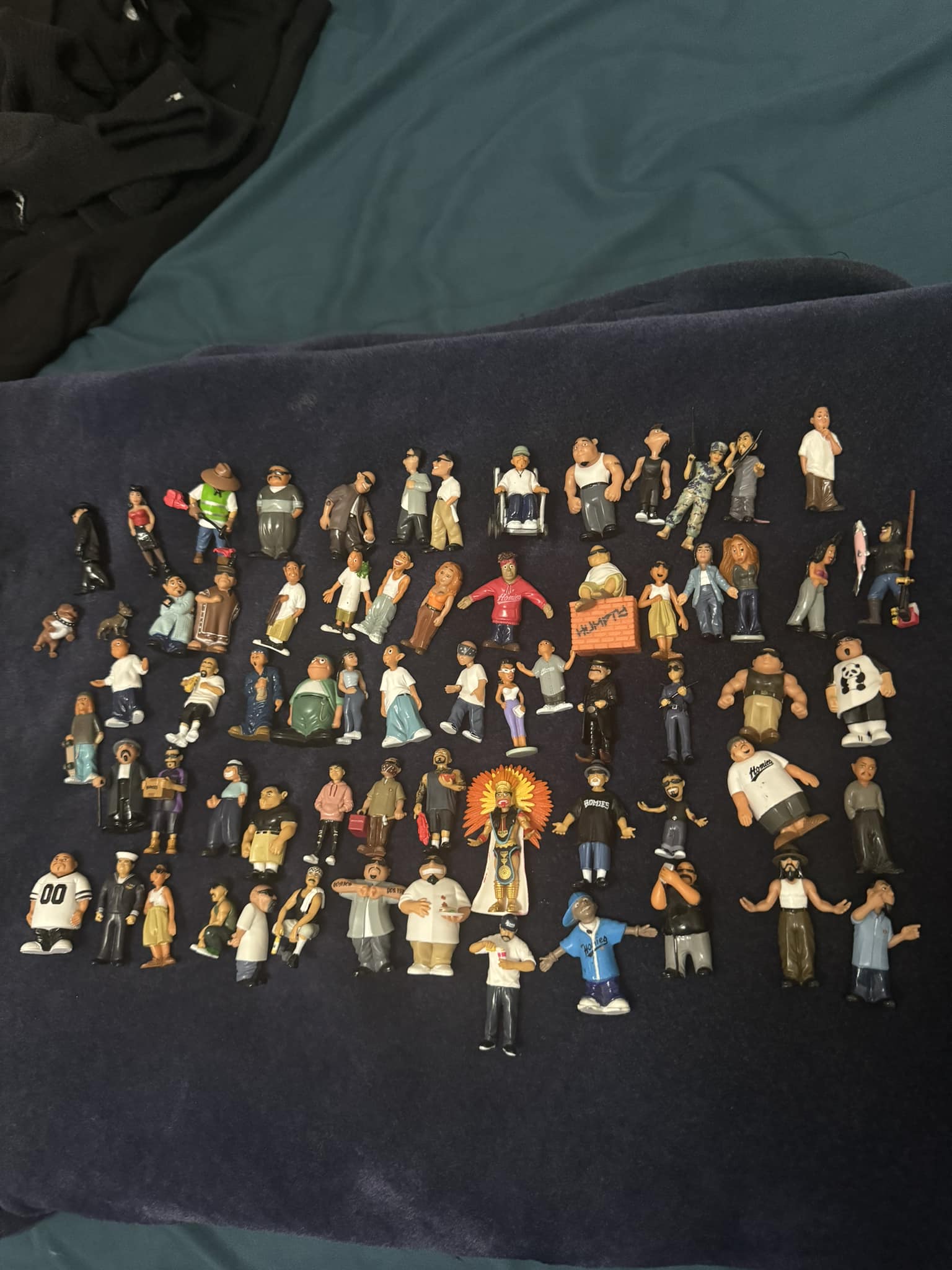 38 homies figures $60 21 mighty beanz $20 Take all for 70