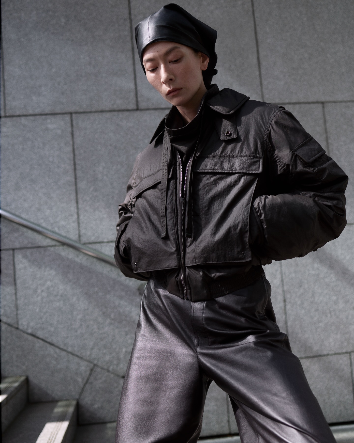 Garments in soft glossy leather and heavy slate denim. LEMAIRE 
