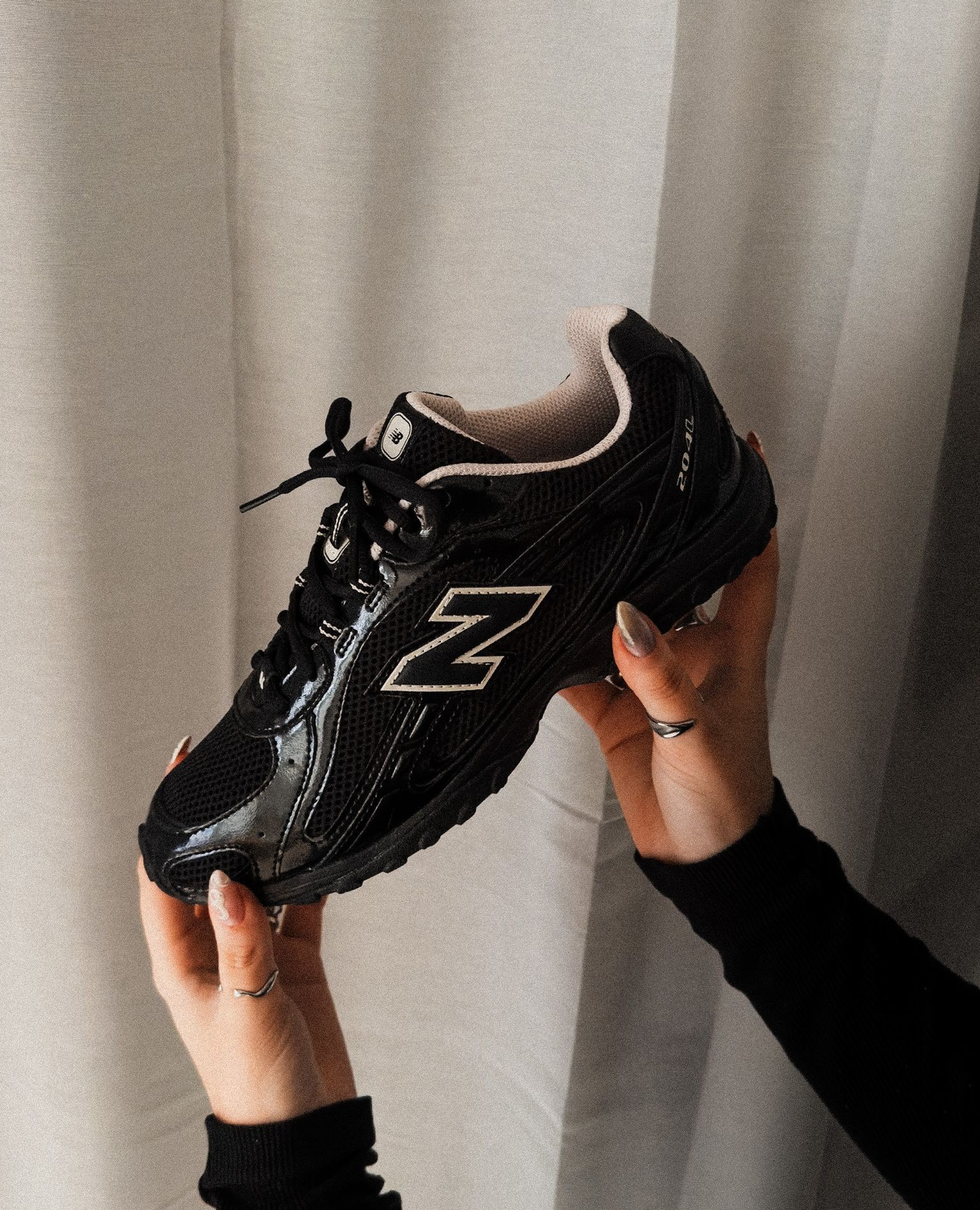 New Balance U204LMRA Black / Timberwolf, a heritage-inspired