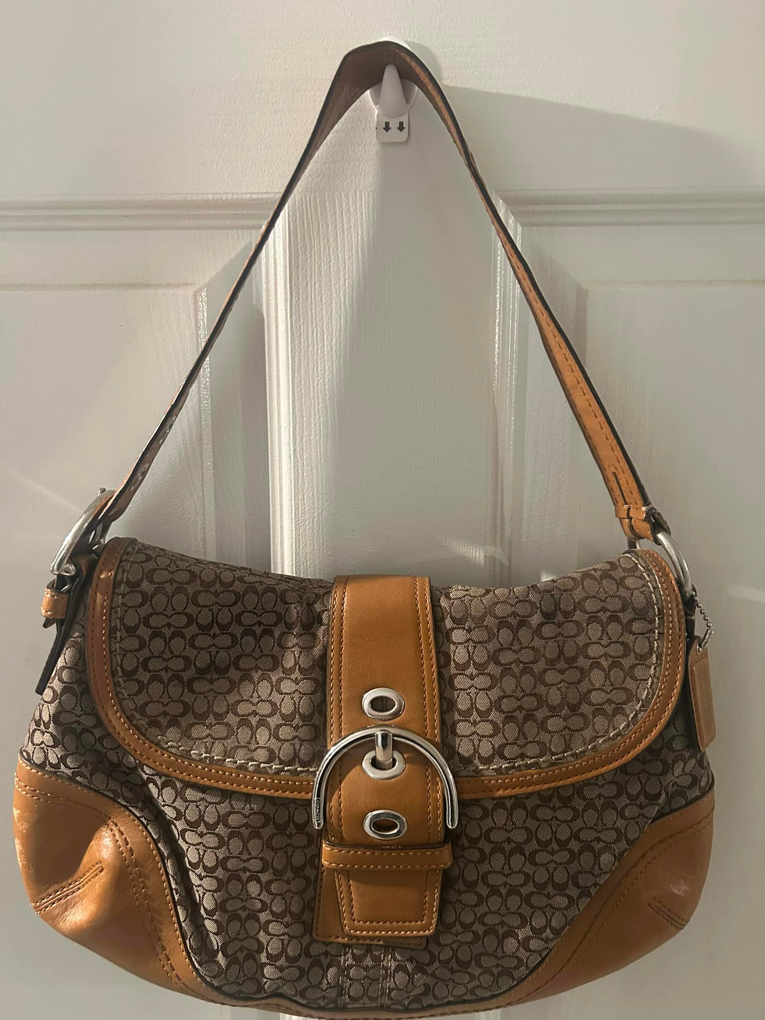 Pre-loved coach soho signature shoulder bag for sale