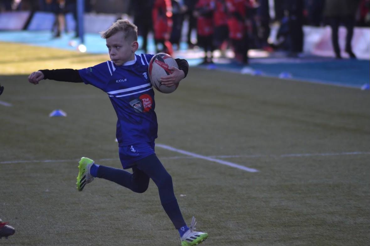 Taylor Plays Rugby