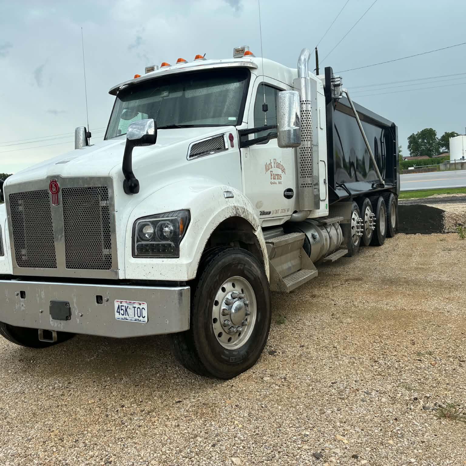 Late-night asphalt hauling on the graveyard shift. Another load headed ...