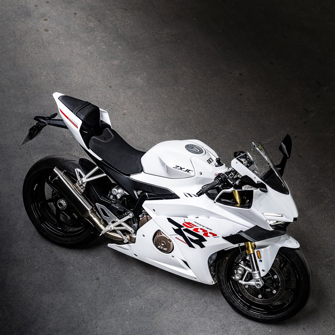 The ZXMOTO 500RR doesn't just pass through. It leaves an