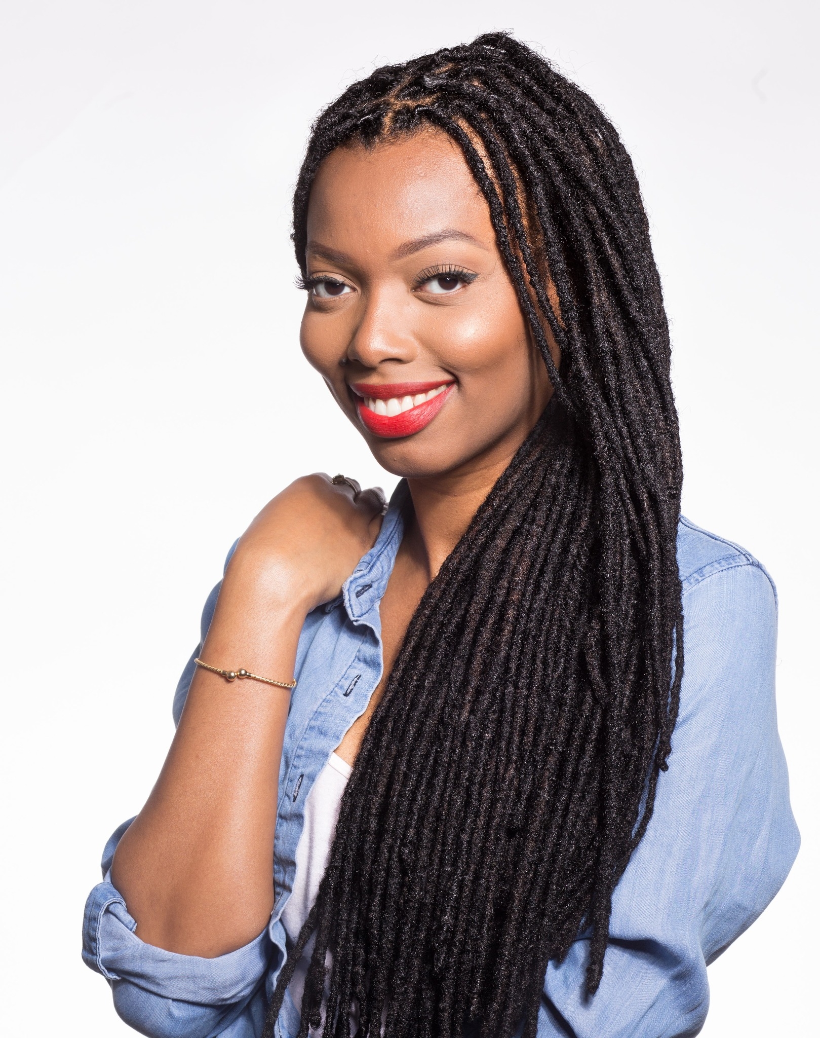 If you’re not ready to commit to cutting loc bangs, this one is for you ...