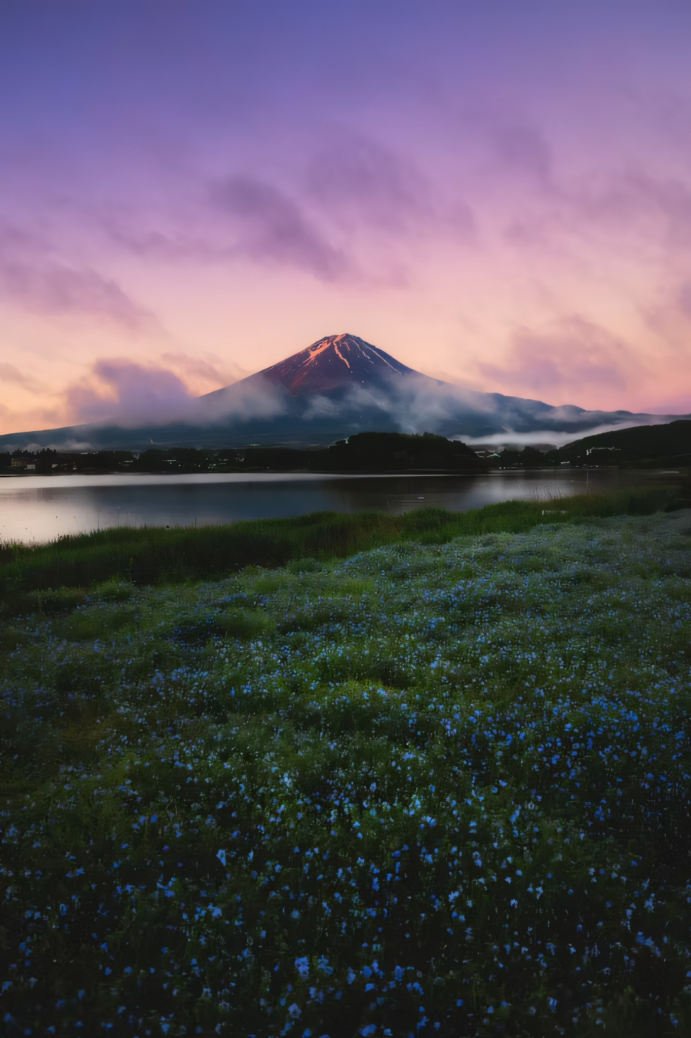 Mount Fuji's Golden Hour Silhouette Over Lake Waters at Twilight