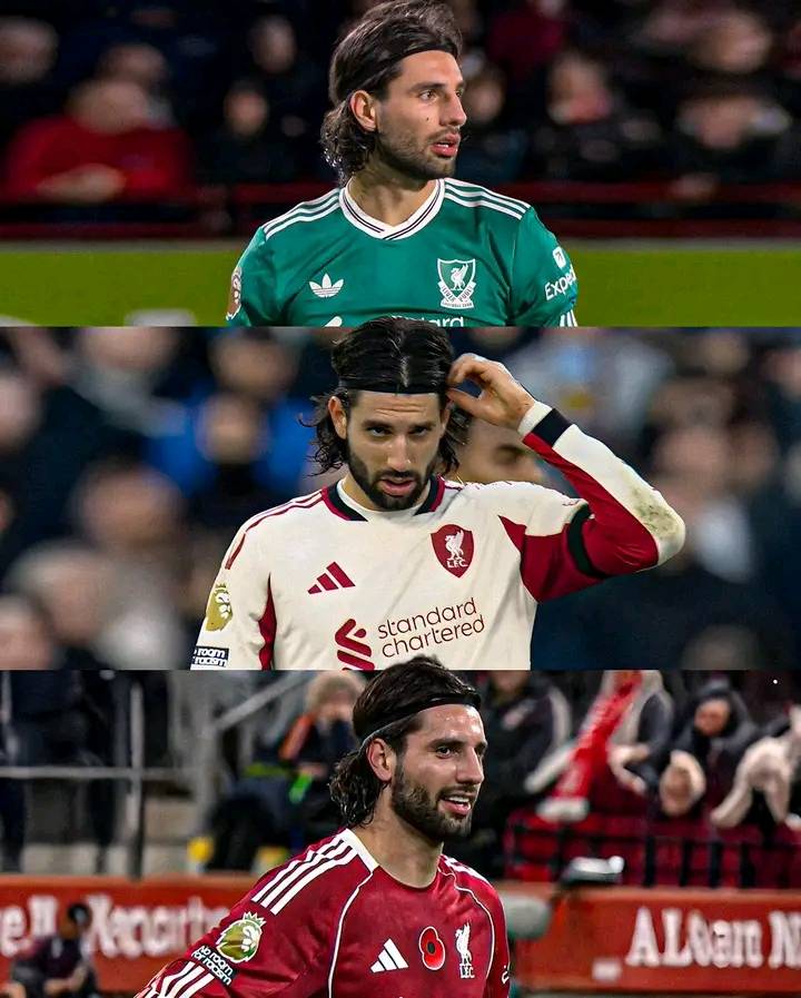 Dominik Szoboszlai #8 with long hair, in red adidas kit.