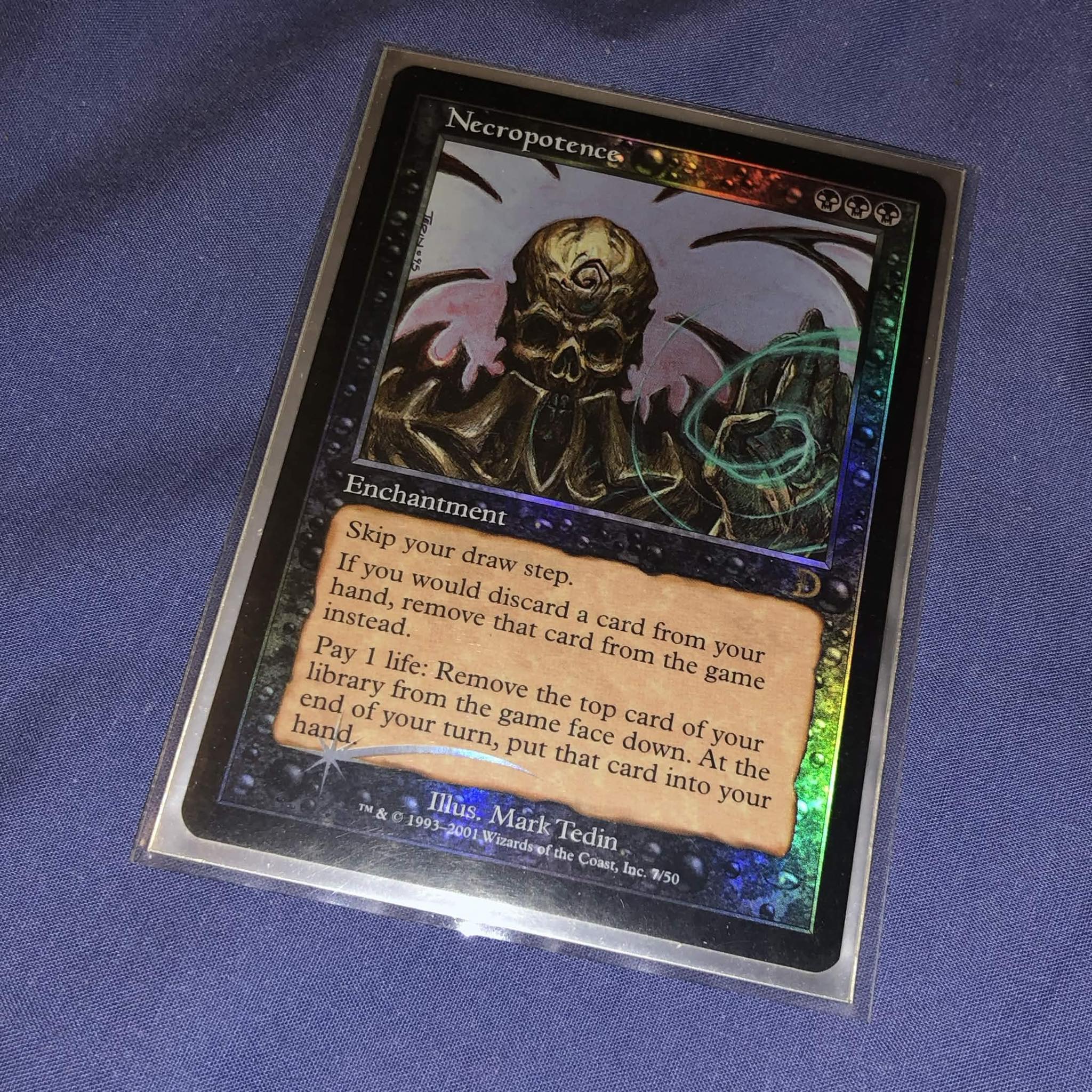 Necropotence enchantment card with holographic border