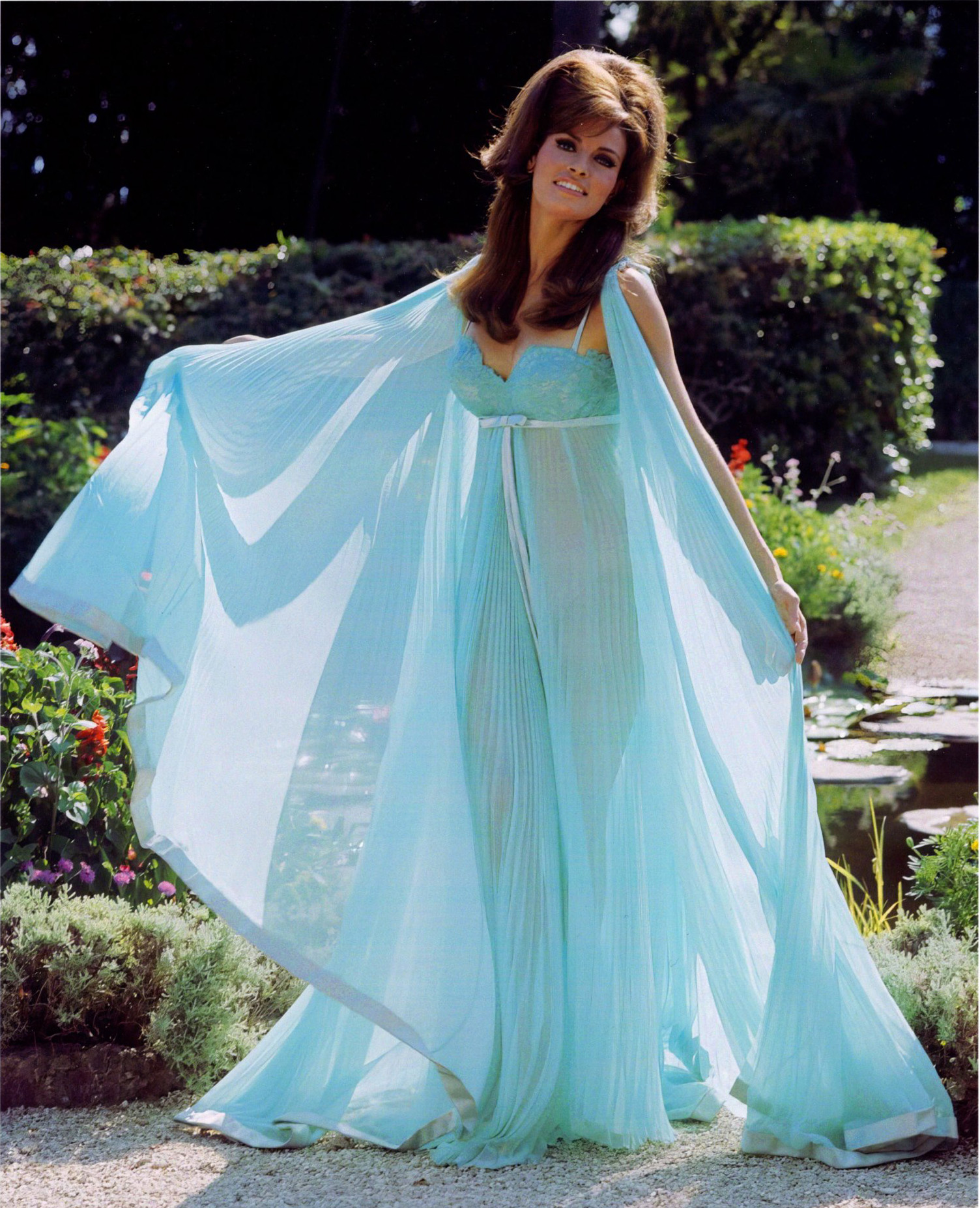 raquel welch green dress Brand new to my collection is this lovely costume portrait of modeling the pale turquoise negligee she wears in 