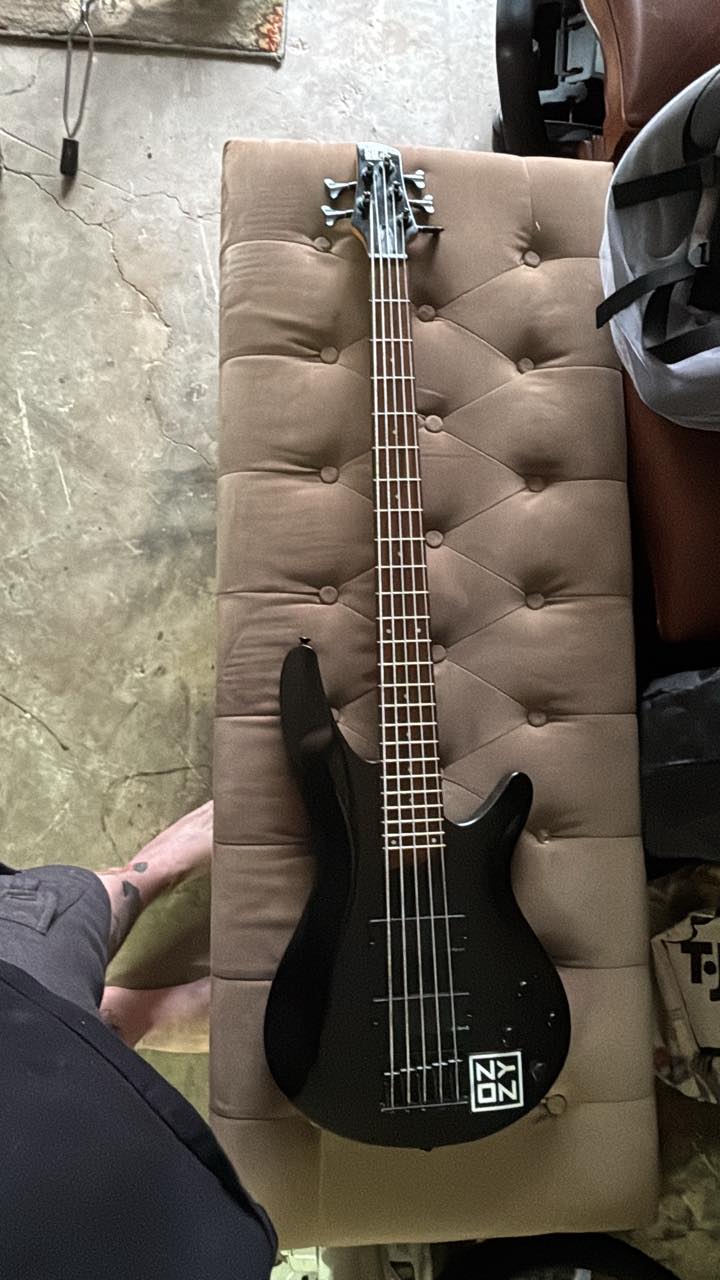 What is this 5-string bass guitar with Ibanez EMG pickups?