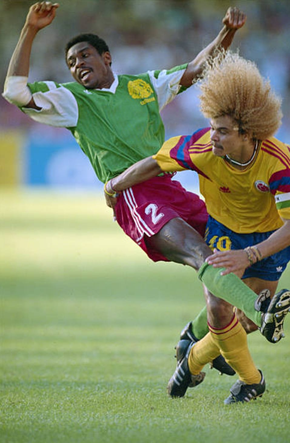 WorldCupPhotoOfTheDay Andre Kana-Biyik of Cameroon and Carlos