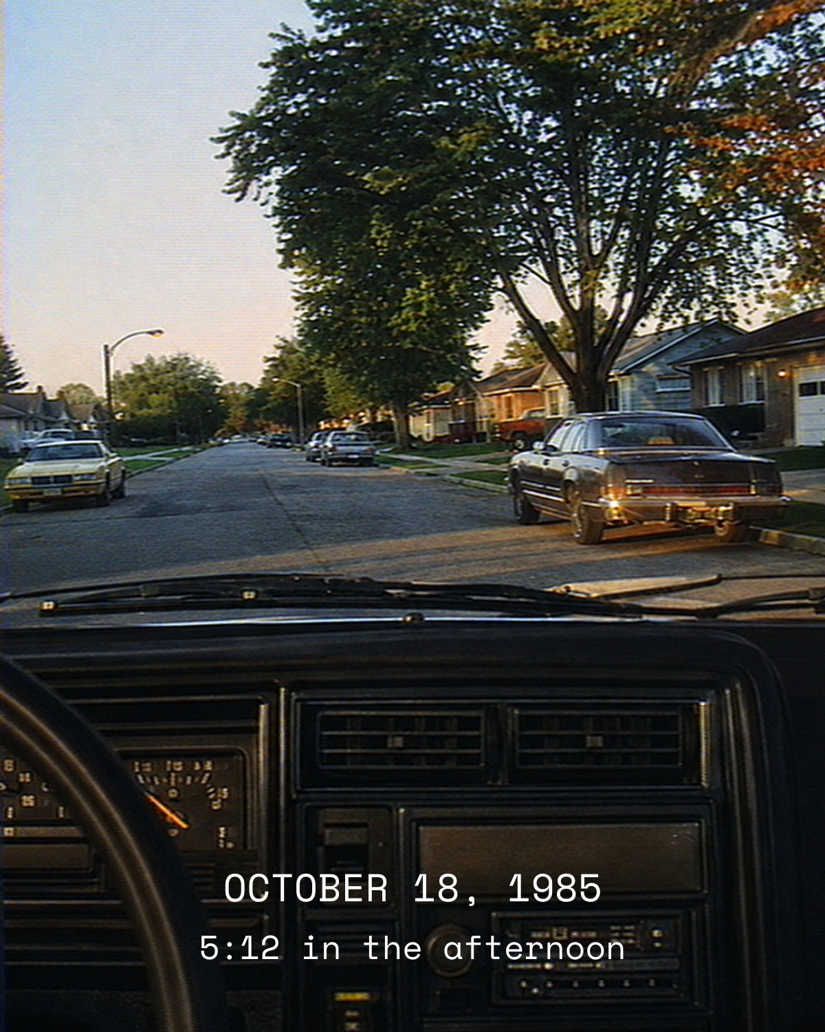 The car door opens. The warning chime sounds. The engine rumbles