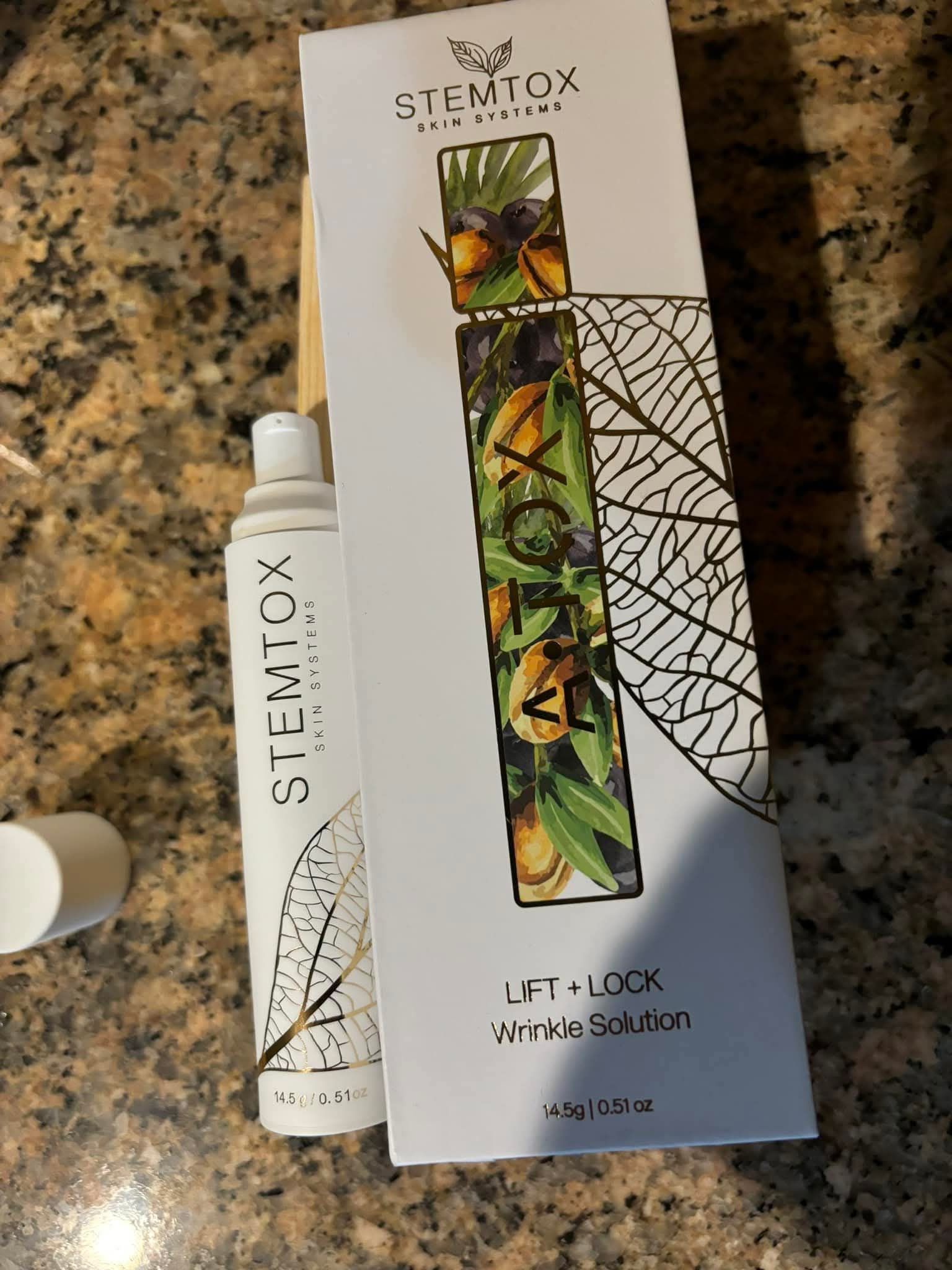 Both bottles are still sealed and unopened. The box was open to 