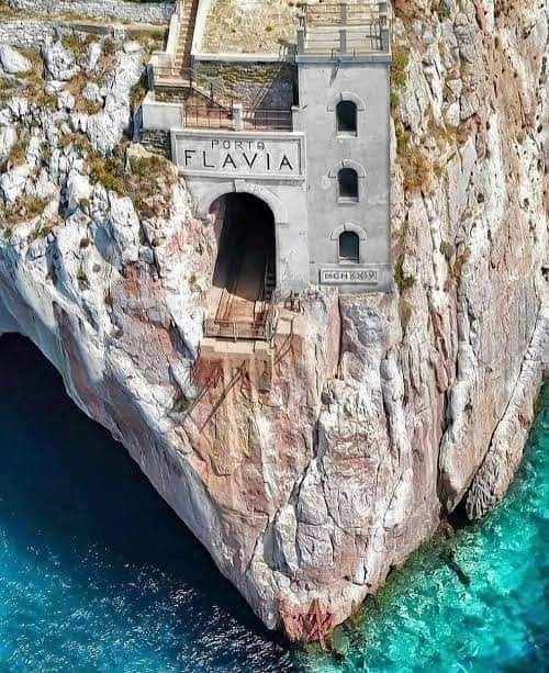 Ancient Porto Flavia seaport in Sardinia, Italy
