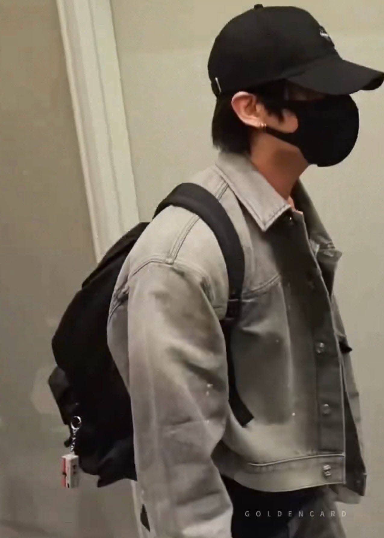 Jungkook's CK backpack with Kodak Charmera keychain camera