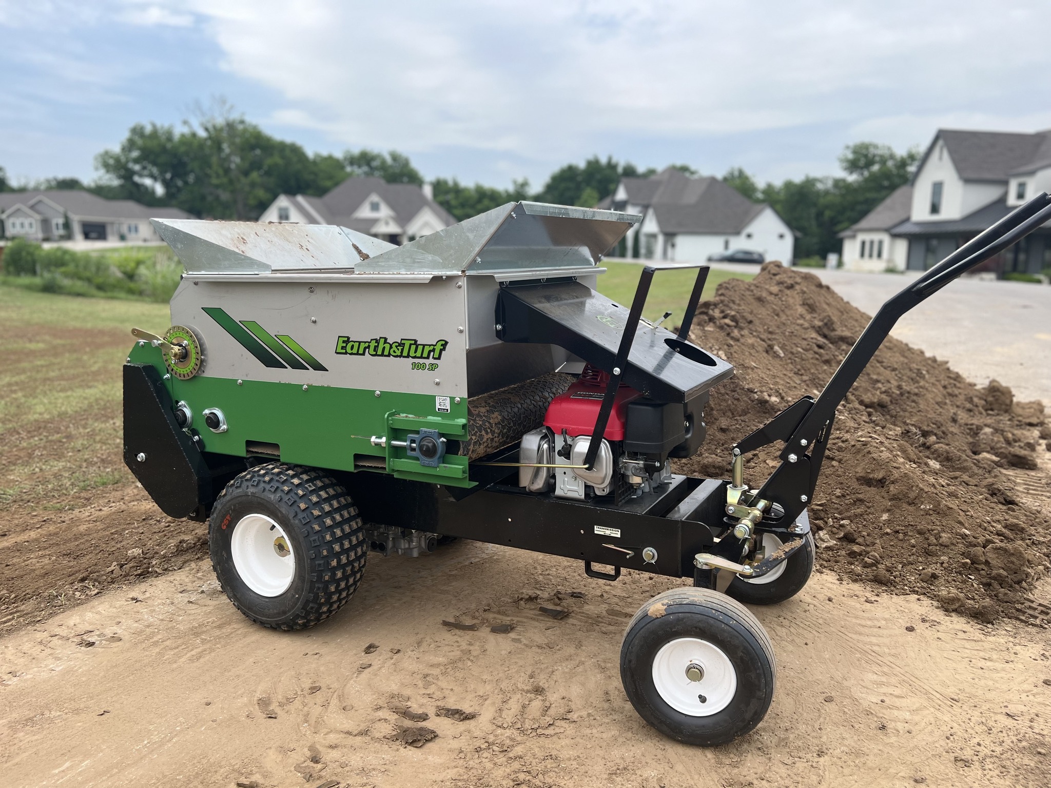 100 pro green top dresser The 100SP is a durably built, reliable topdresser with a heavy duty TuffTorq transmission and 13HP Honda engine. Spread up to 1,000 lbs of sand, topsoil or compost with the precision of Silver/Silver