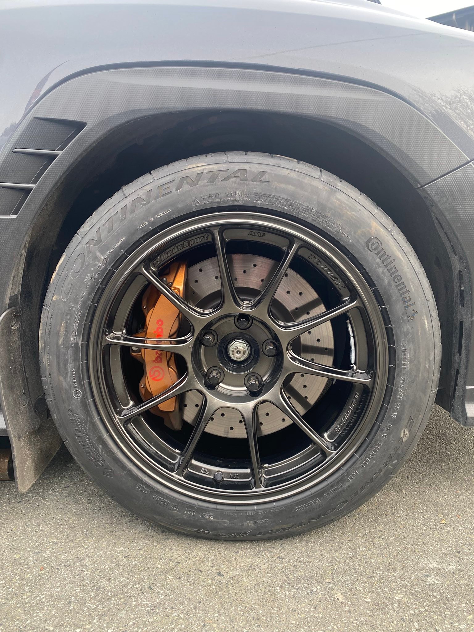 Test fitting summer wheels on Subaru WRX