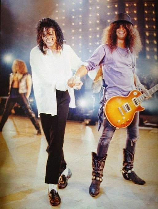 Michael Jackson and Slash on stage, 1995. Photo by KMazur