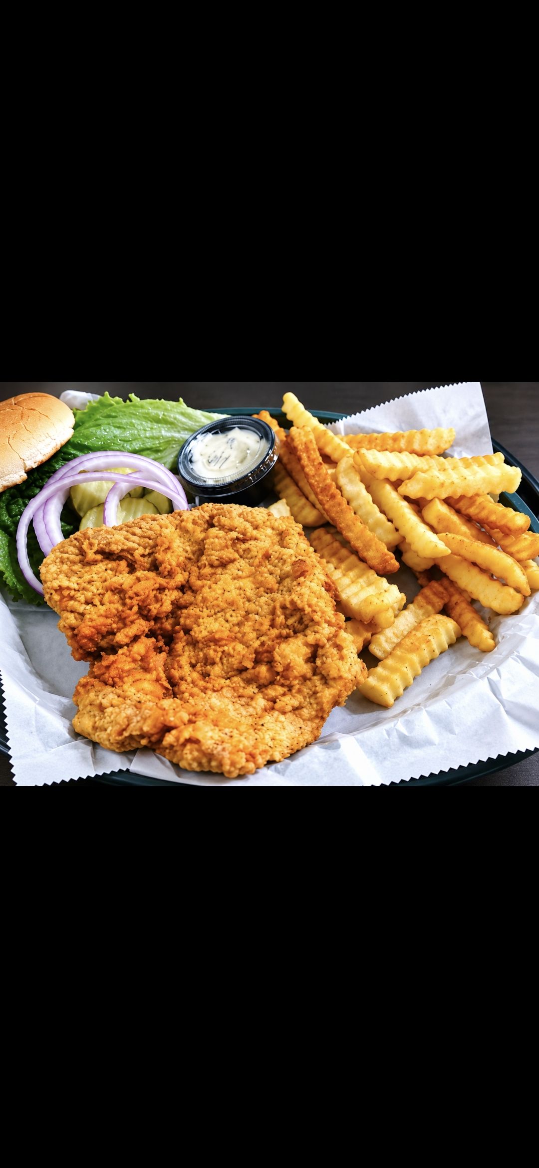 Trackside Diner's thick-cut, hand-tenderized pork tenderloin