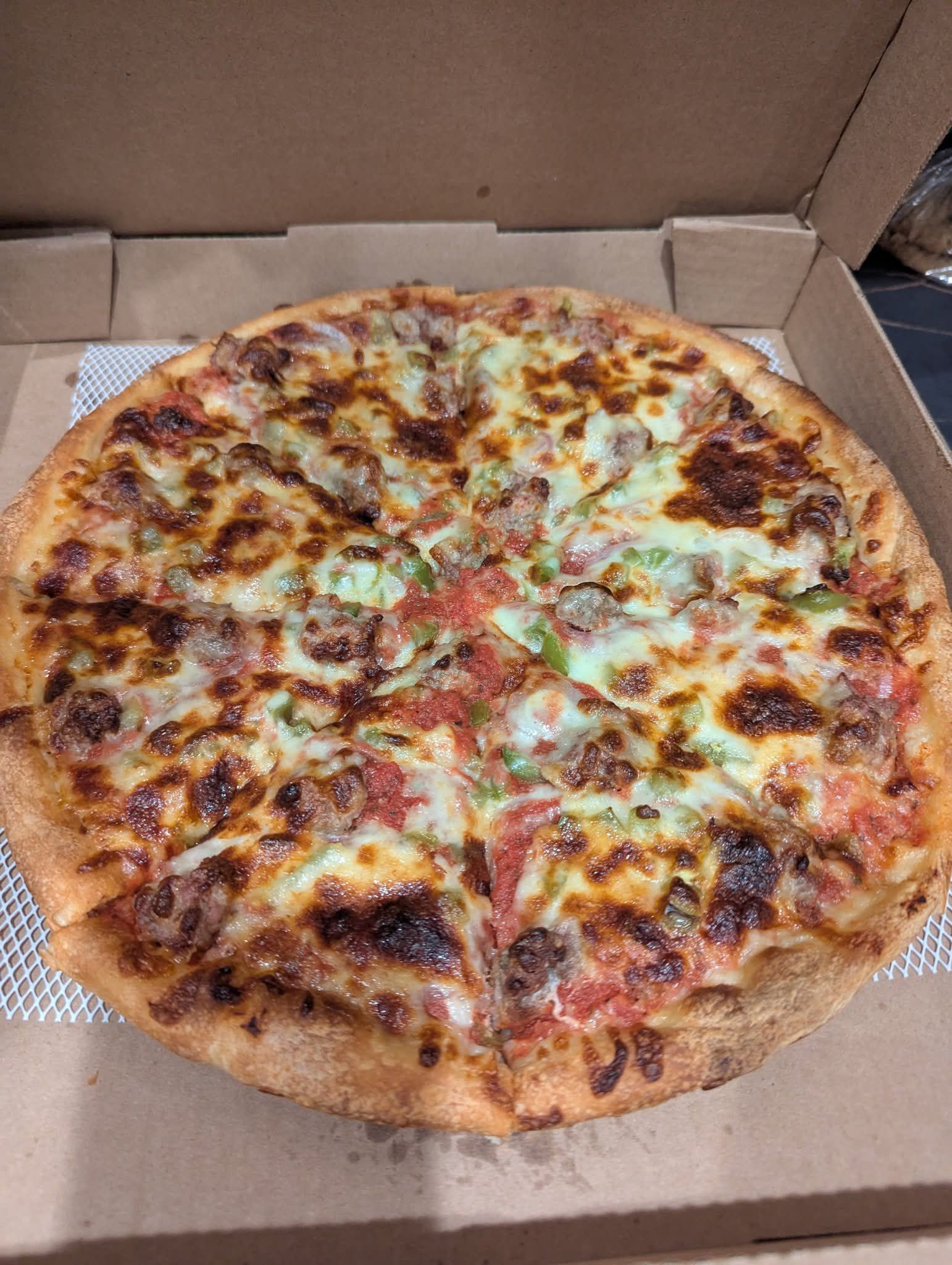 Papa Jimmy's sausage green pepper and onion pizza review