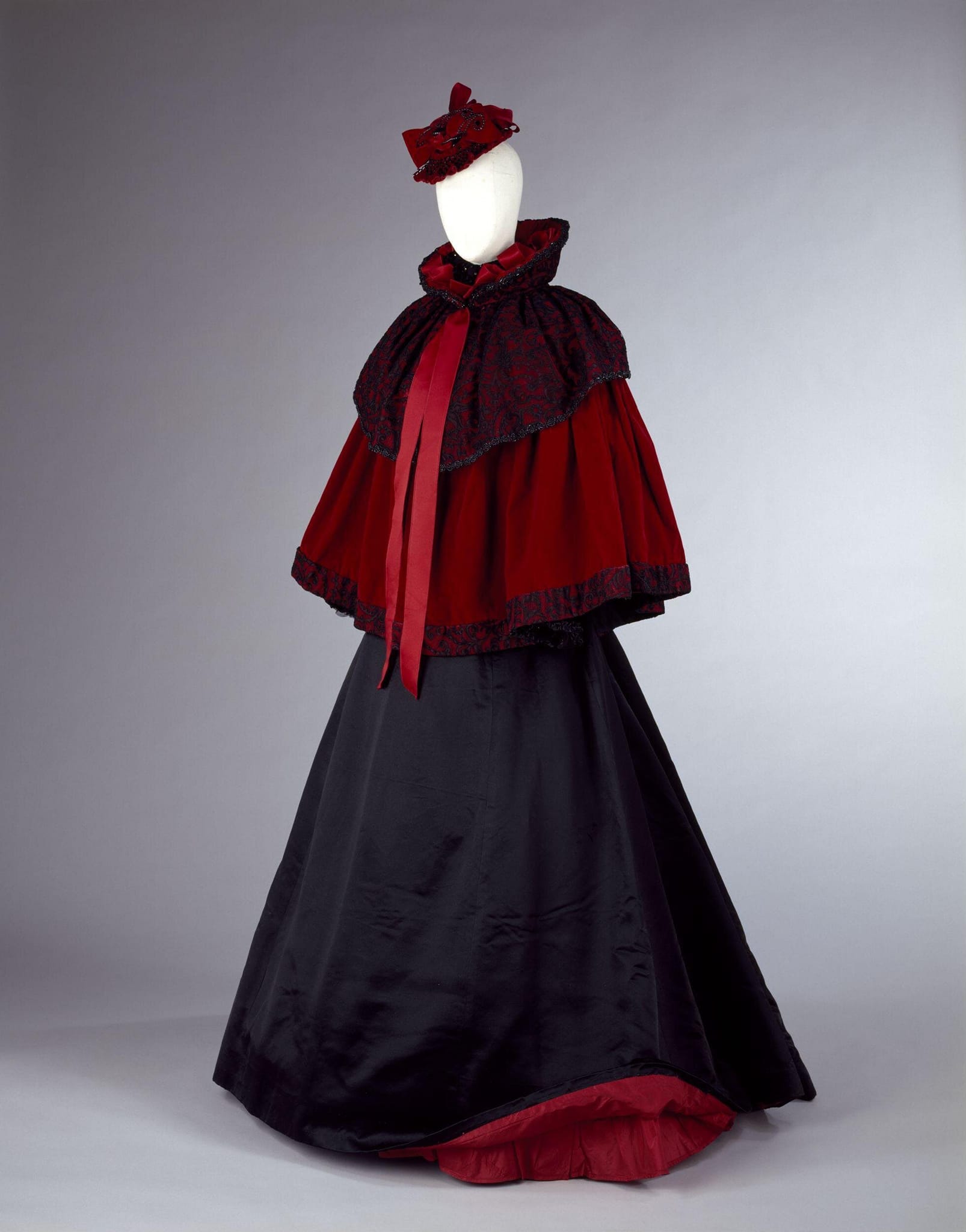 Victorian-style wool winter cape with high collar