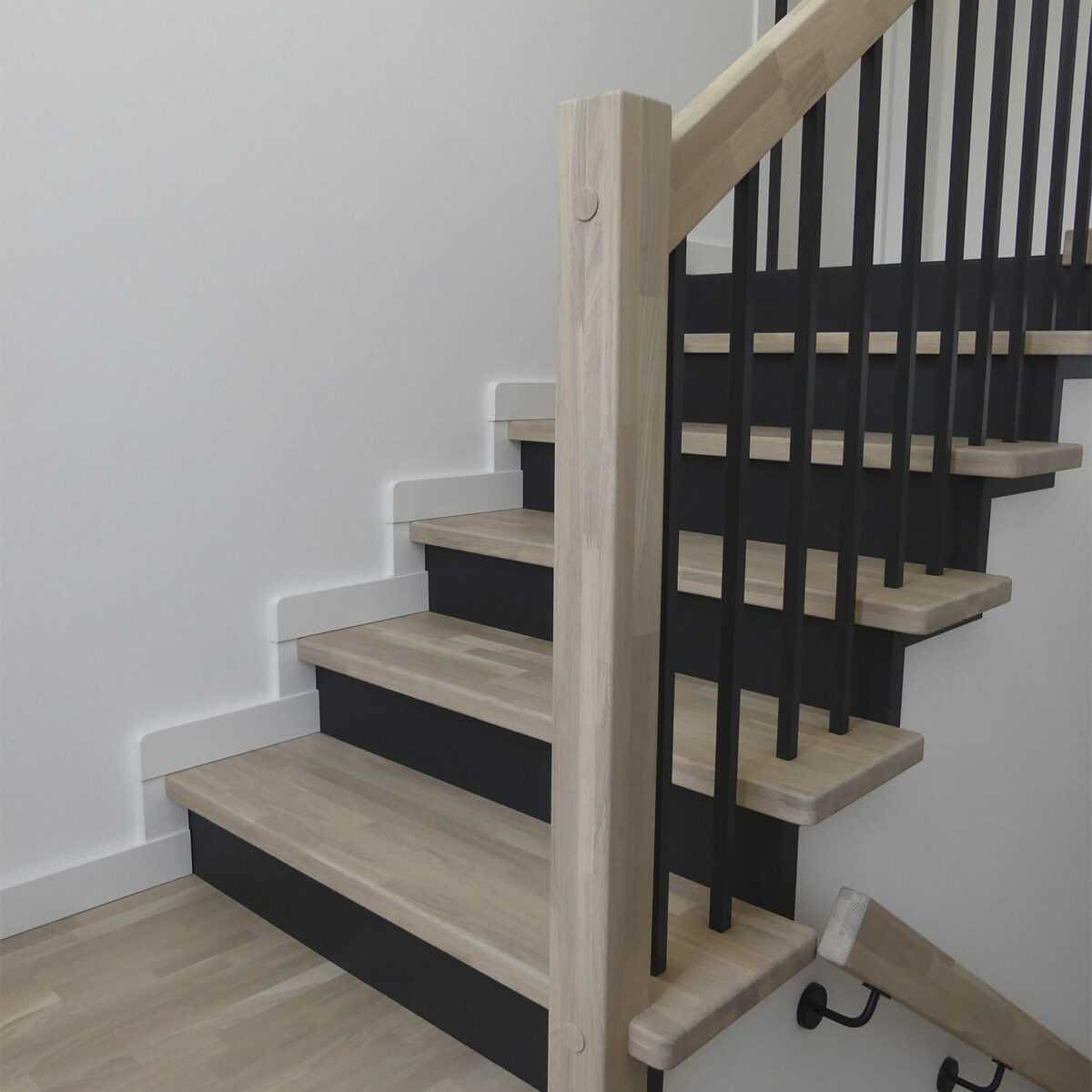 Leveling an uneven stair riser surface before installation. 🔨🪵 ...