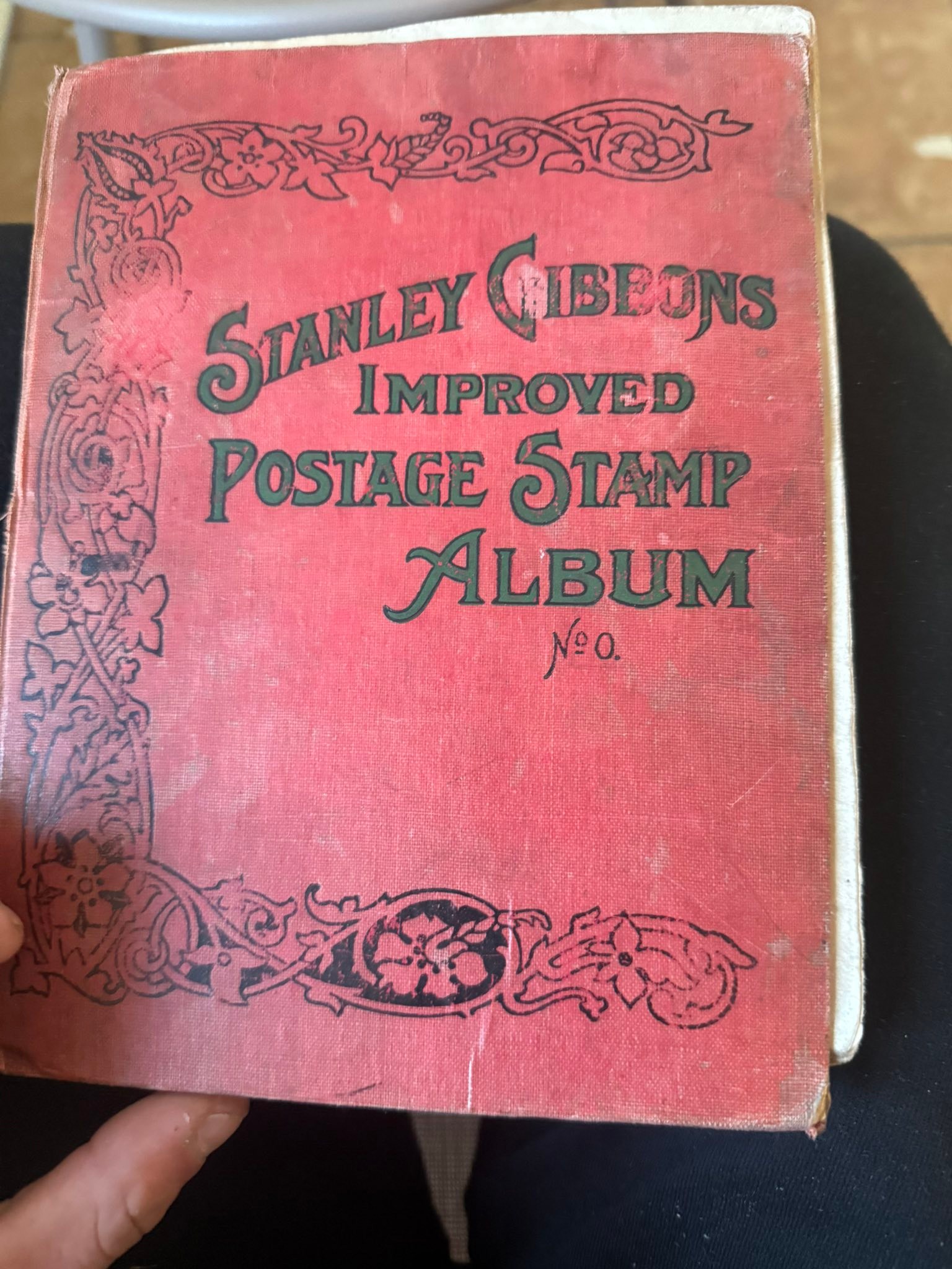 What is the value of a Stanley Gibbons Improved Postage Stamp Album?