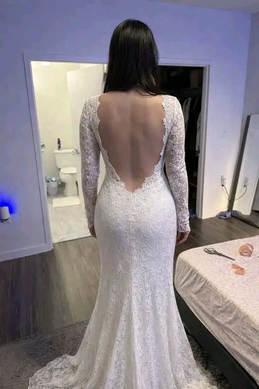How to hide back wings on a wedding dress?