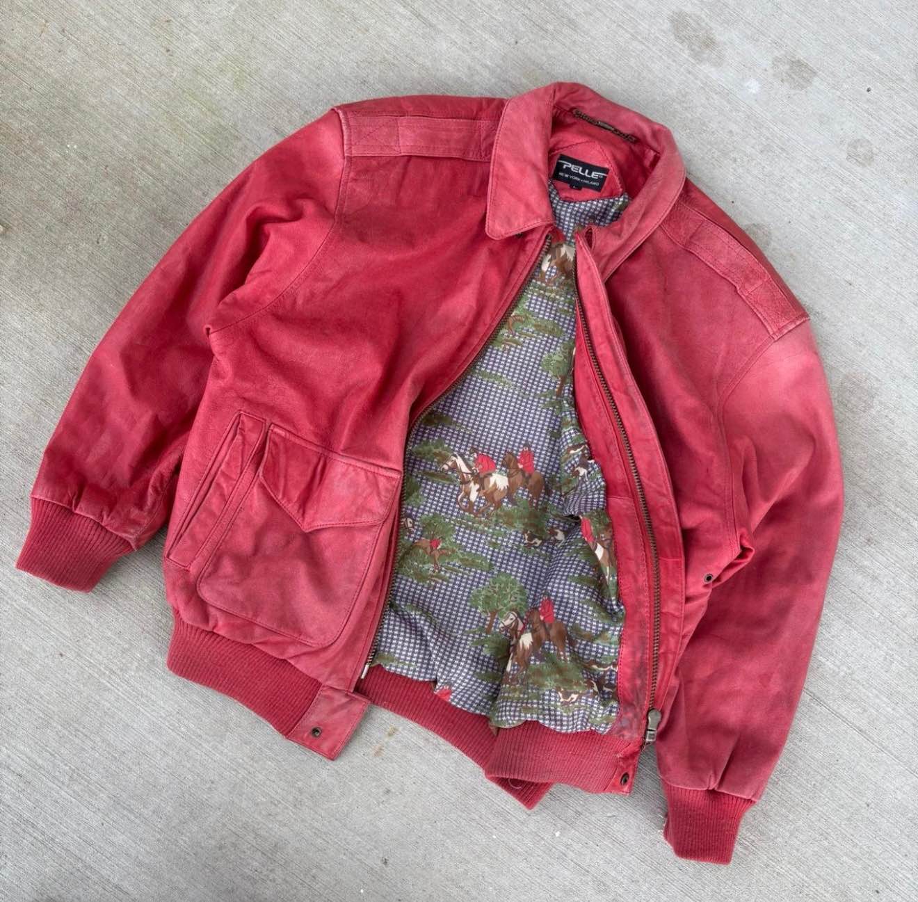 Authentic late 90s / early 2000s Pelle Pelle jacket in a bold red 