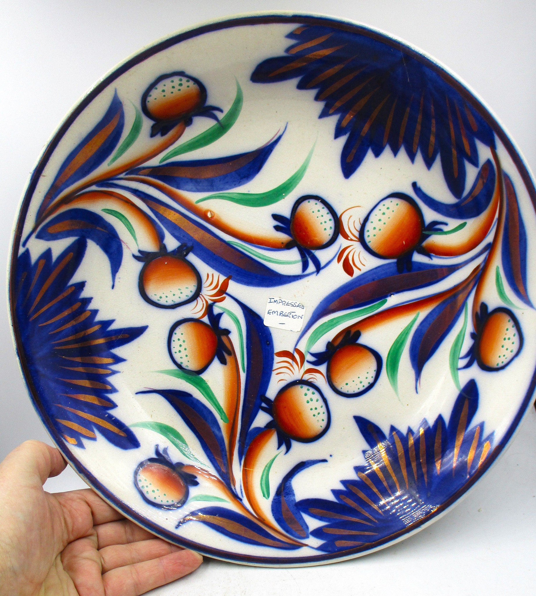 Staffordshire shell-edged plates with America's great seal
