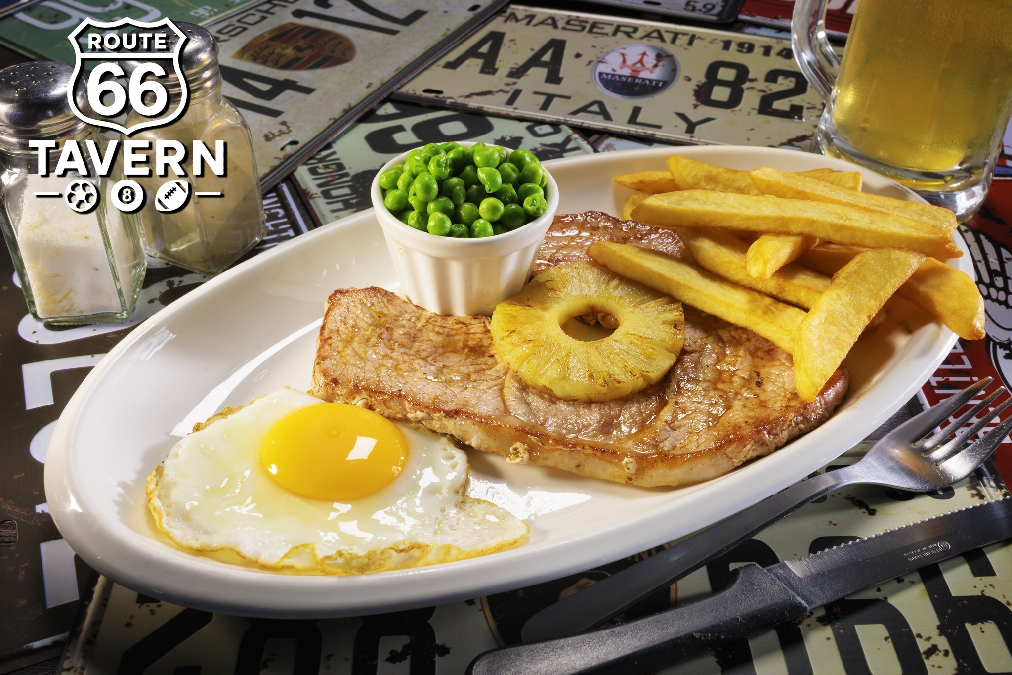 66 - **Gammon Steak** A hearty grilled gammon steak topped with a ...