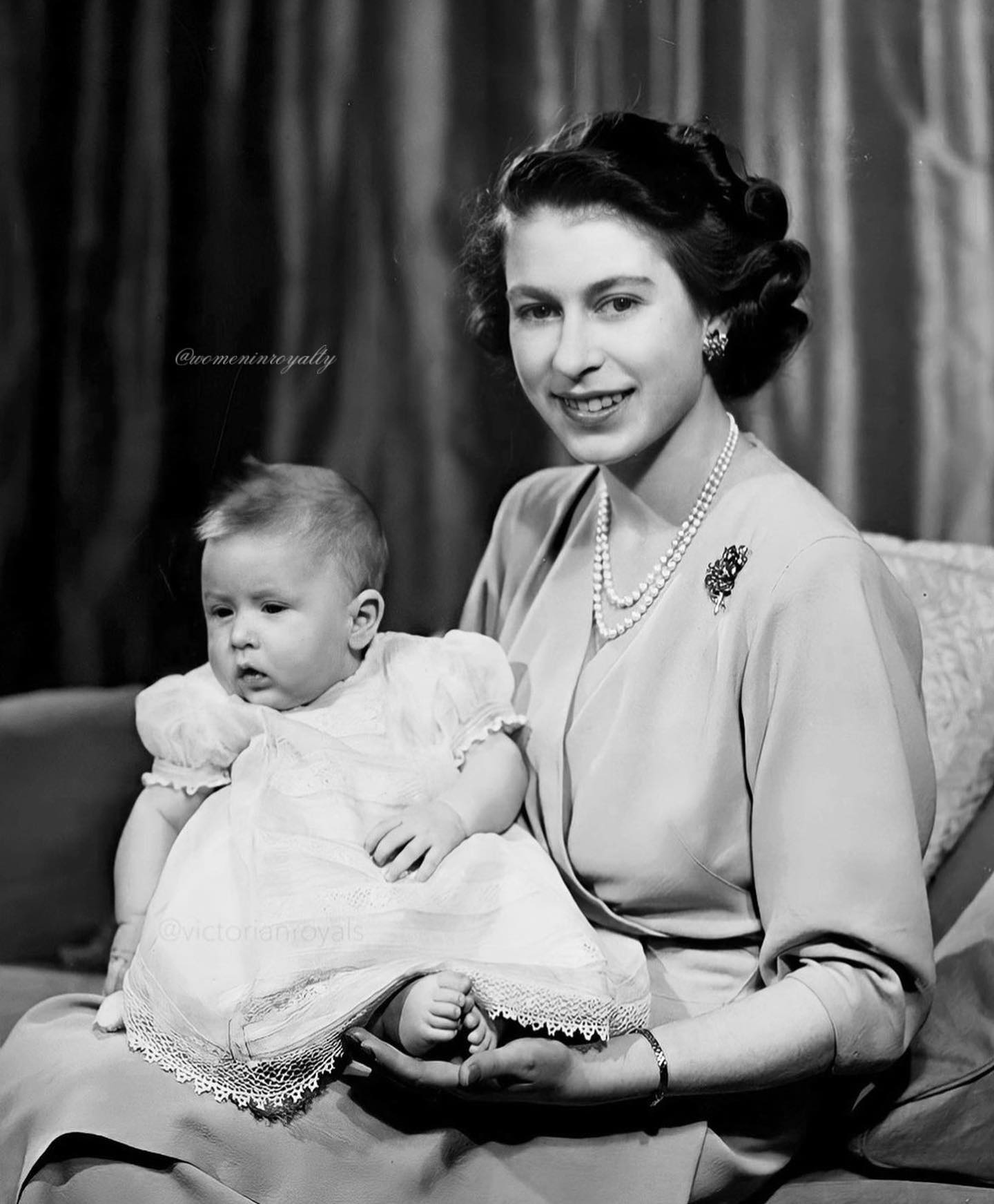 Queen Elizabeth II and Prince Charles in 1949