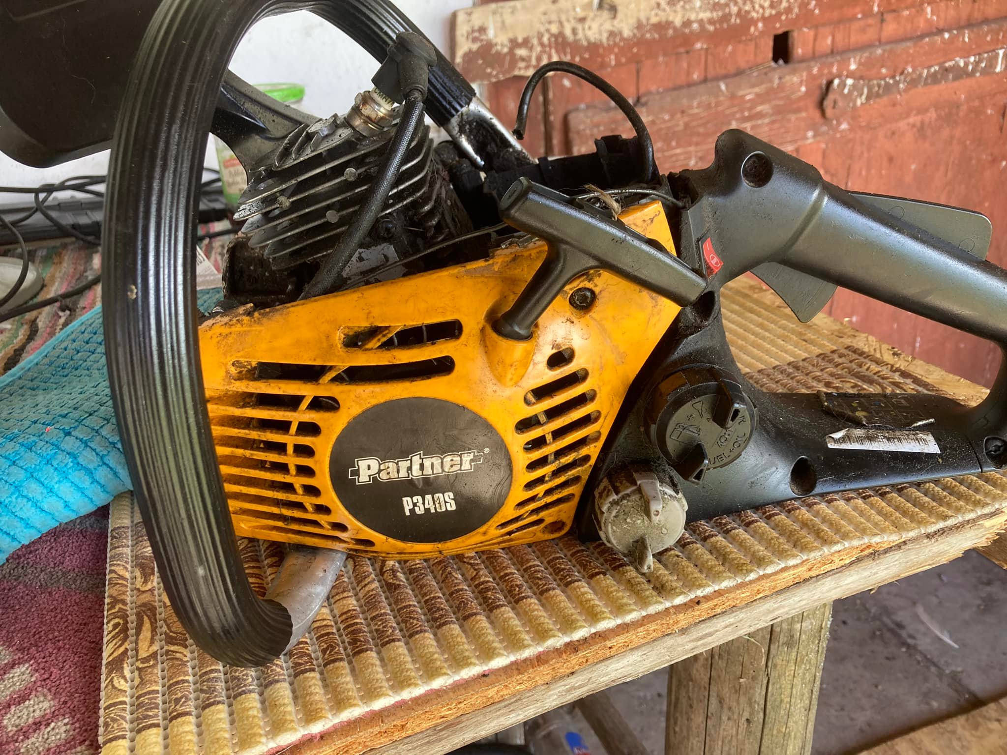 Should I keep a new 54cc Zenoah clone chainsaw or a rebuilt Poulan
