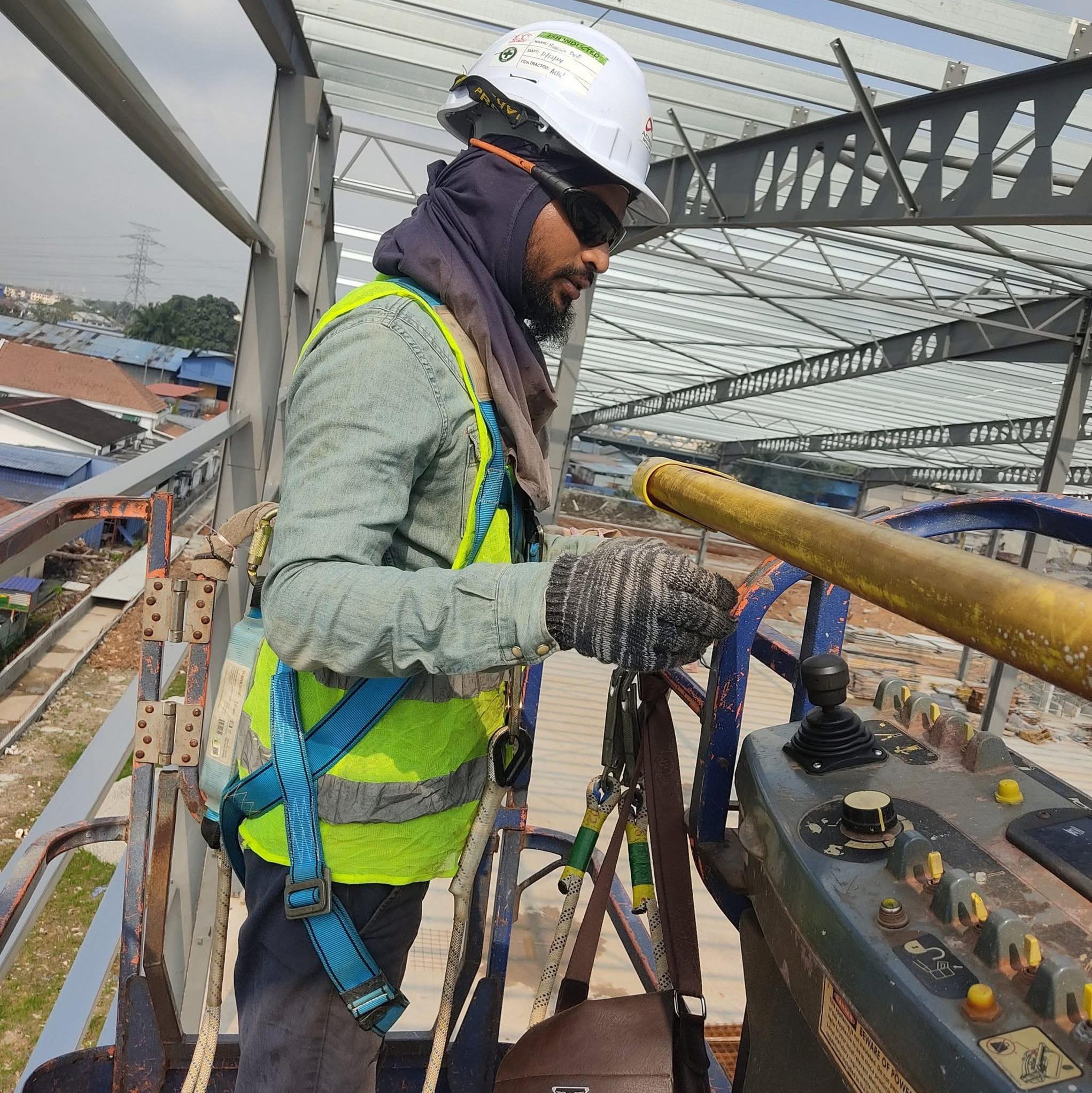 A close-up look at precision plate fitting and metal fabrication. The ...