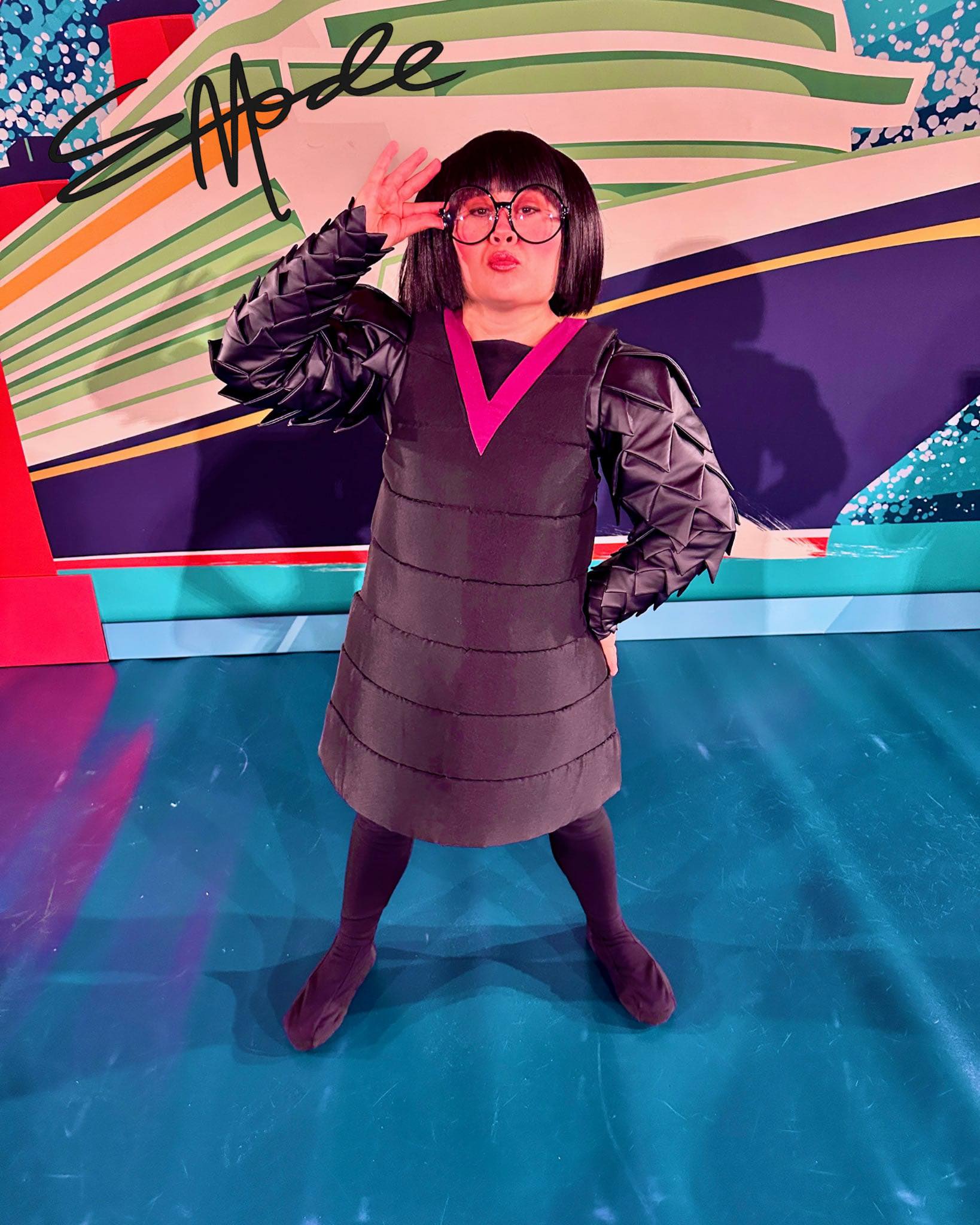edna mode blue dress has entered the building… and you know what that means. ✨🖤 Fashion advice, superhero design tips, and of course—NO CAPES! If you could have Edna design a super suit for Color:electric blue velvet
