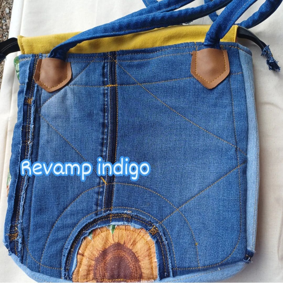 Upcycled denim bag with recycled leather handle
