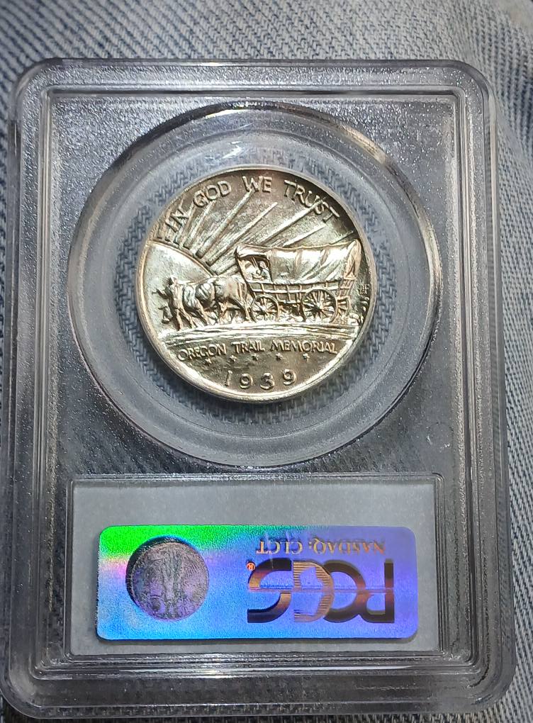 What do the letters and numbers on coins signify?