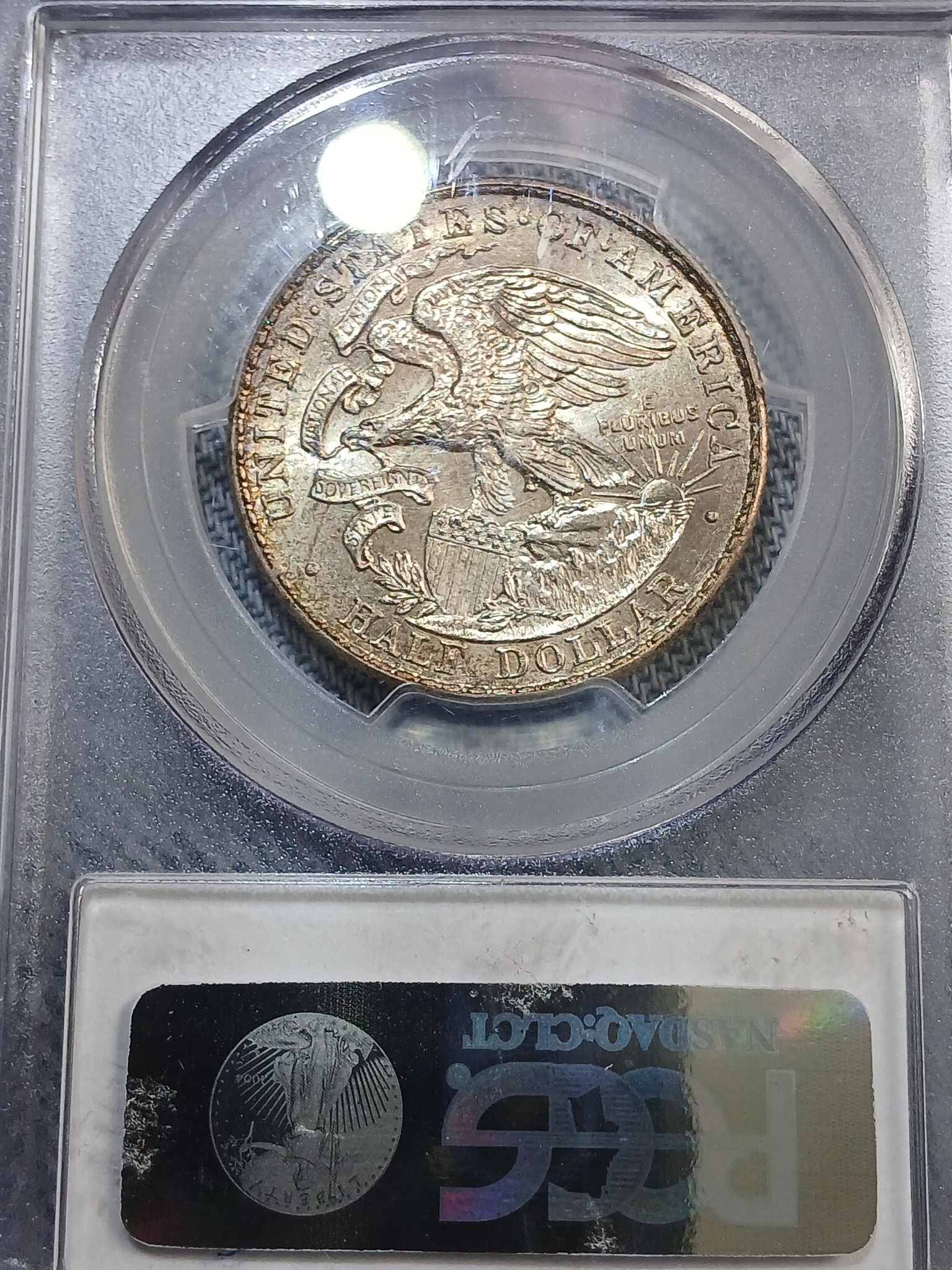 What do the letters and numbers on coins signify?