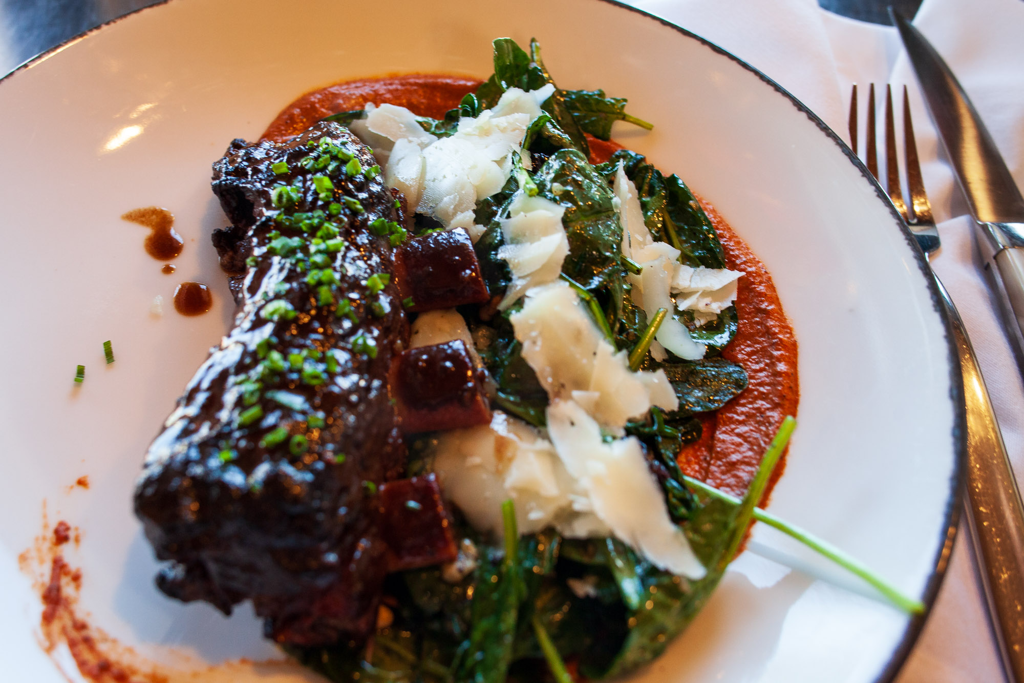 Skogen Kitchen - Buffalo Short Ribs with romesco, spinach,...