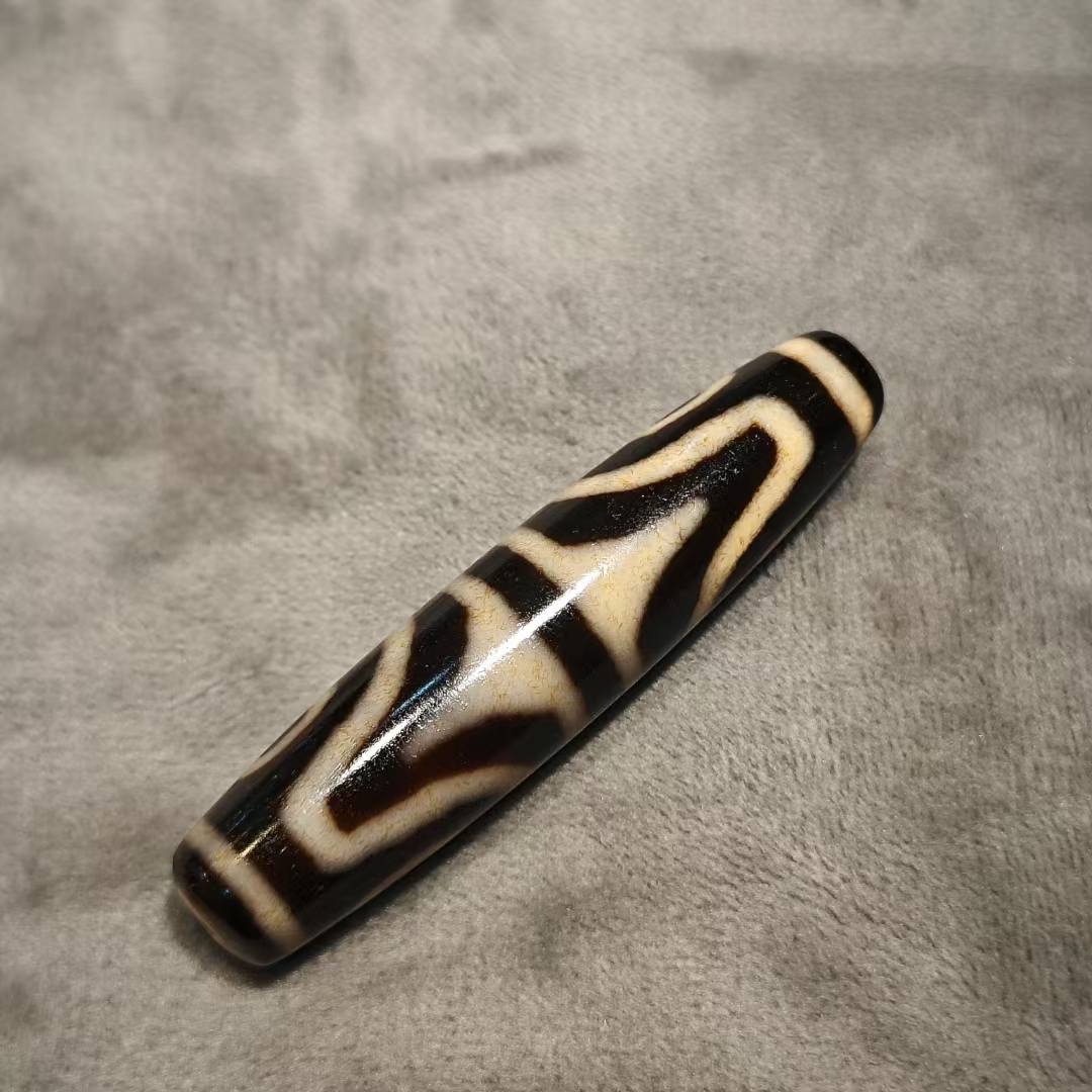 虎牙四眼天珠​尺寸52.9x12x11.7mm