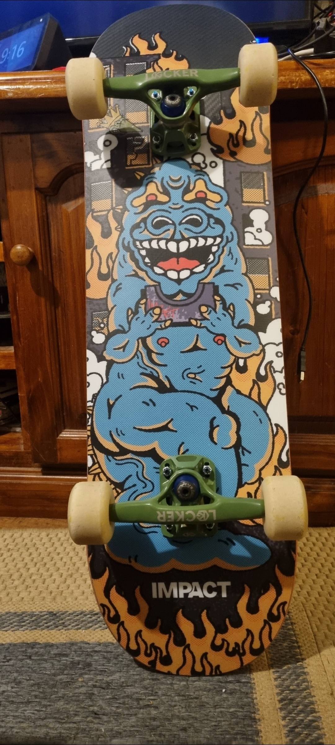 New Impact XPU Zilla skateboard deck with cartoon design