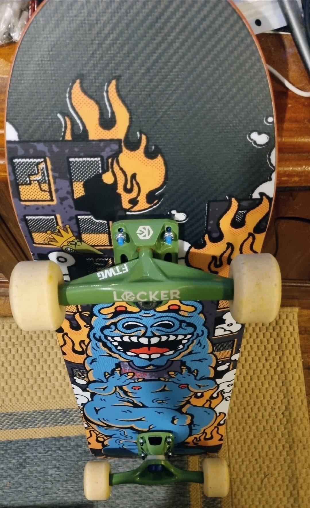 New Impact XPU Zilla skateboard deck with cartoon design