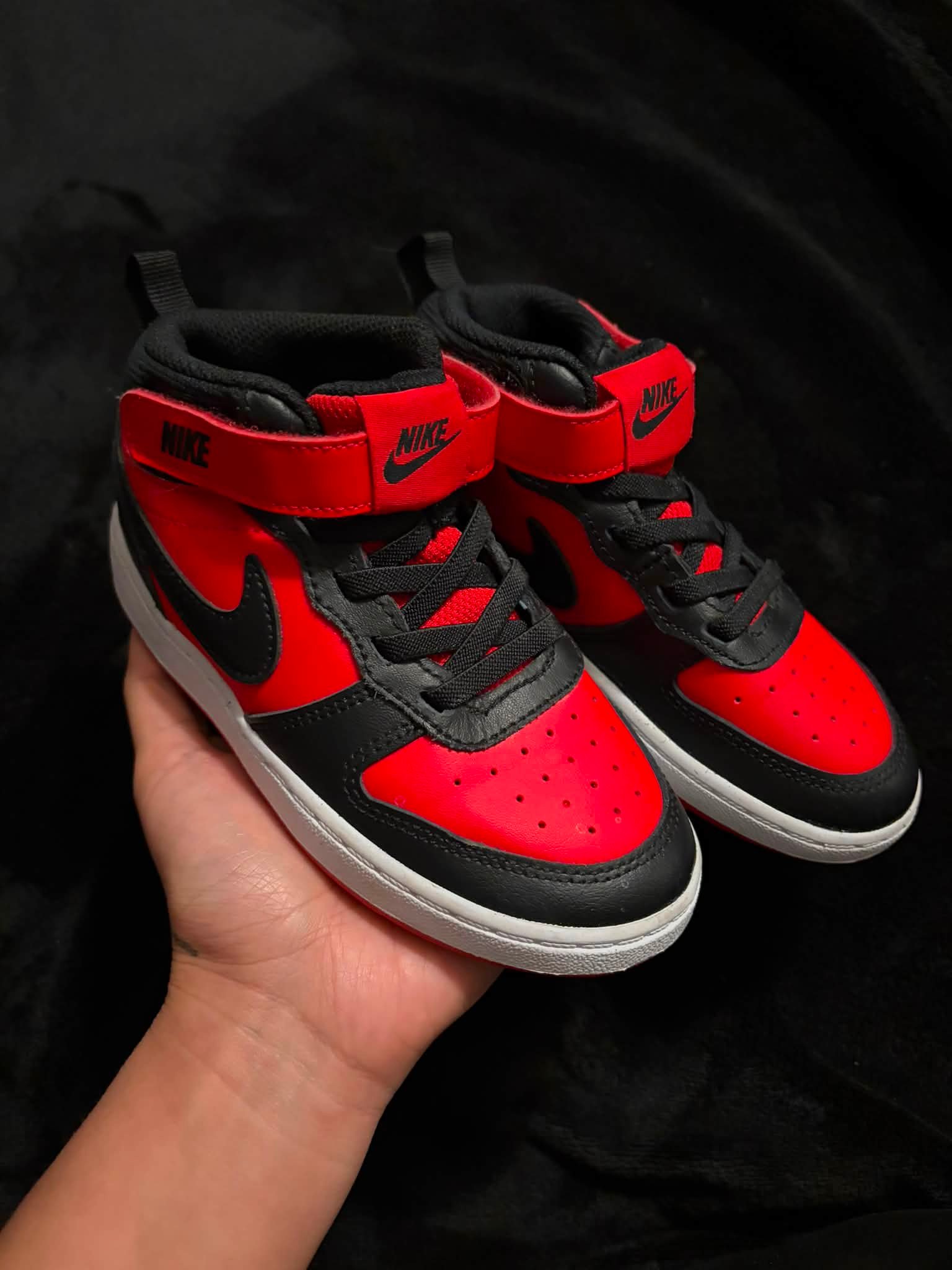 Pre-owned collection of three pairs of high-top sneakers. The