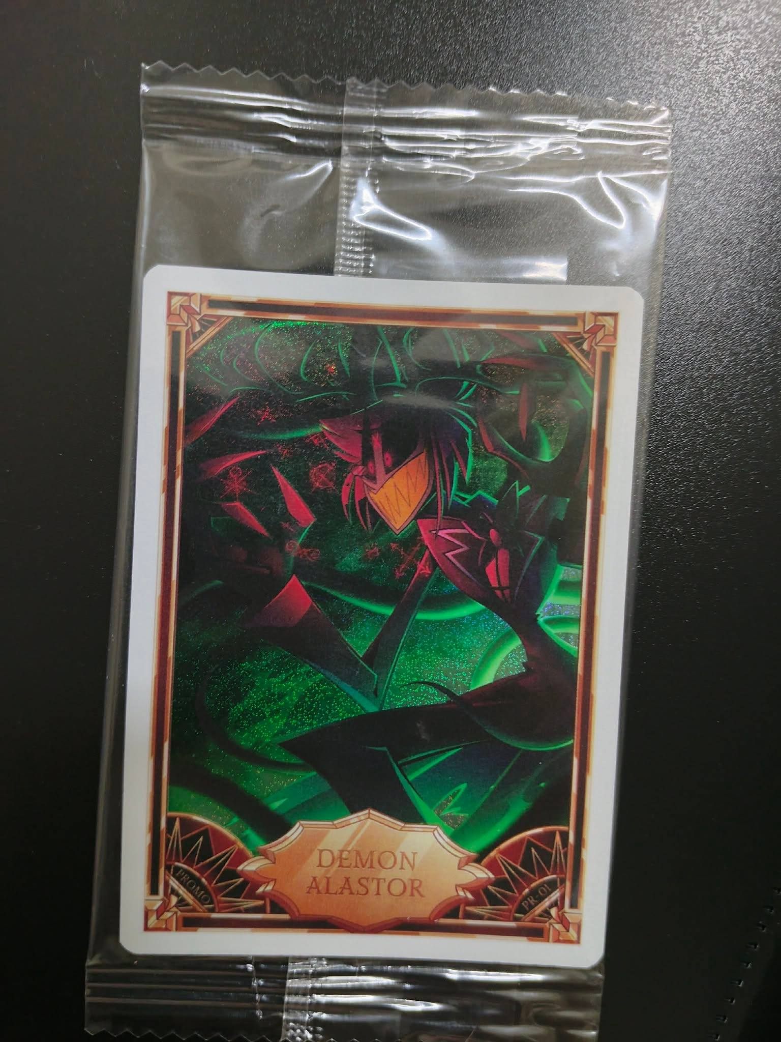 Is this Demon Alastor Hellverse promo card authentic?