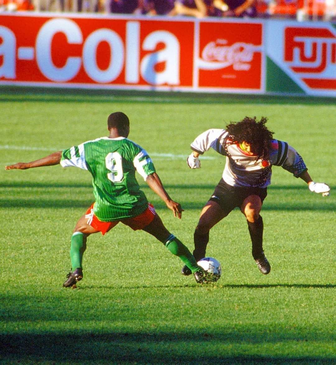 WorldCupPhotoOfTheDay Roger Milla of Cameroon stealing the ball