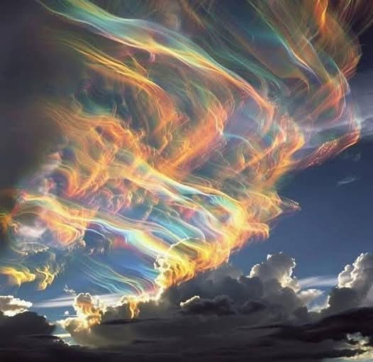 What causes a rainbow to form an 'X' shape?