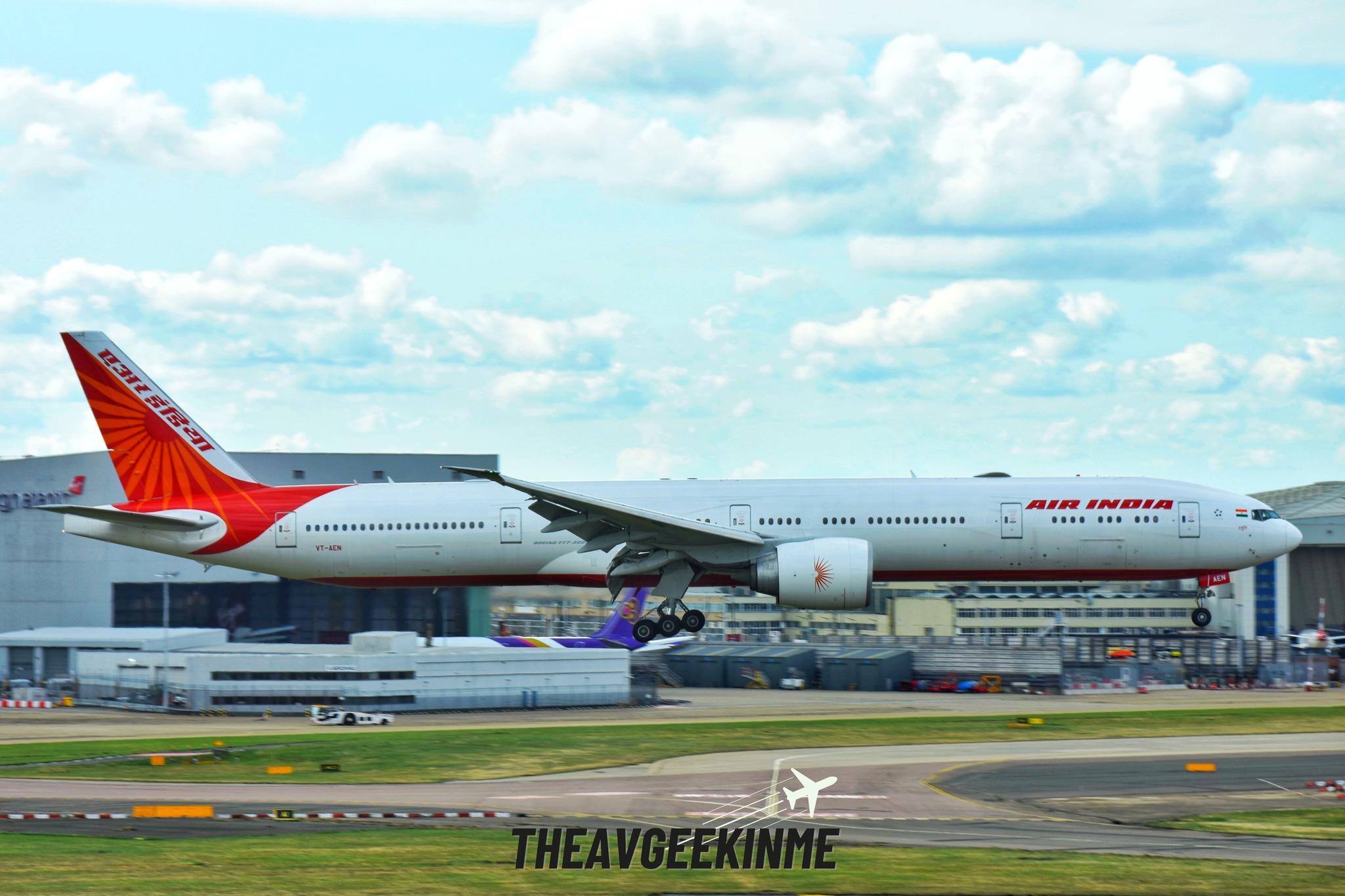 An Air India Boeing 777-300ER is seen taxiing to its gate at