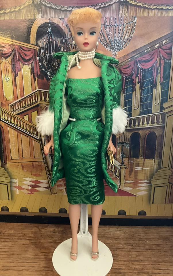 Barbie in 1959 Evening Splendour dress in a vintage lounge